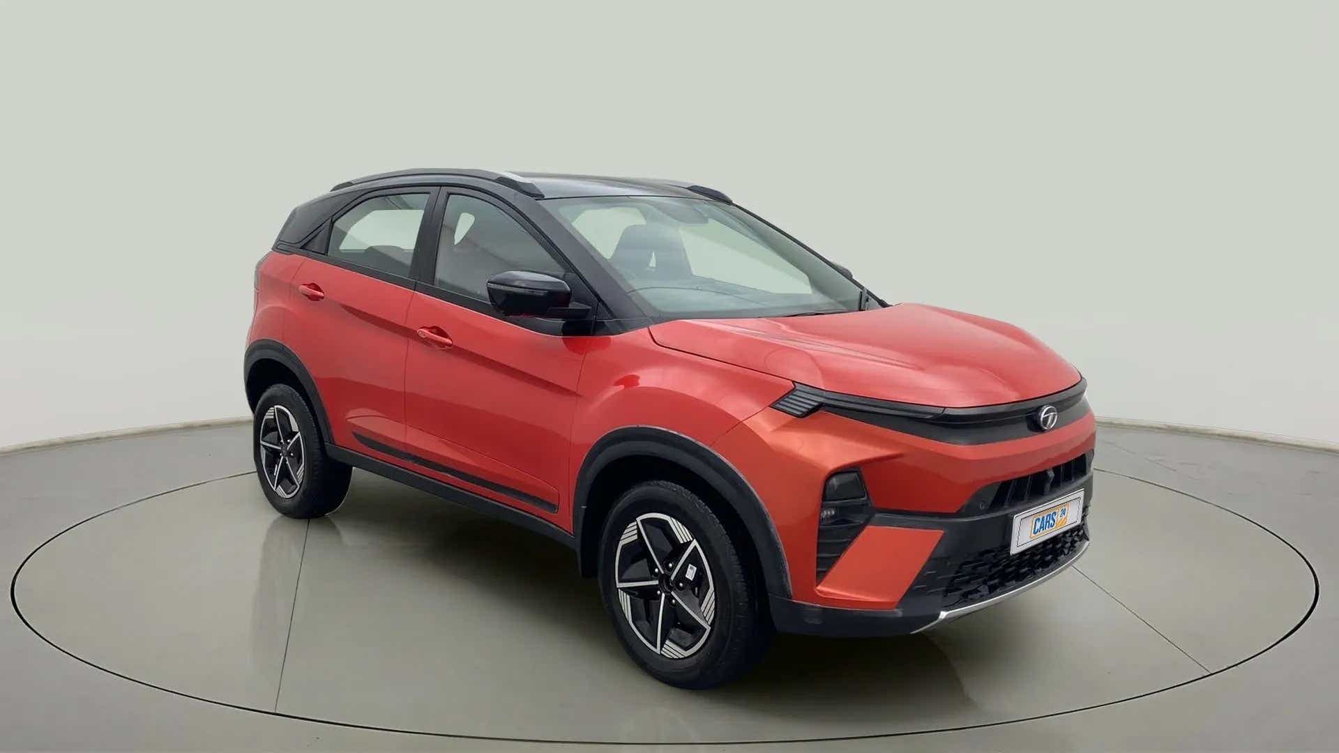 Front three-quarter of a Flame Red Tata Nexon 2017-2023