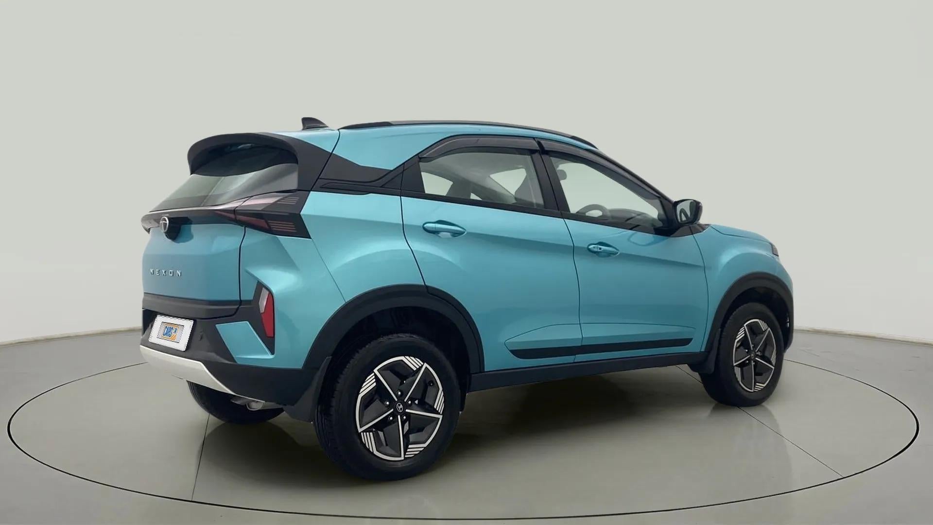Rear three-quarter view of a Tata Nexon