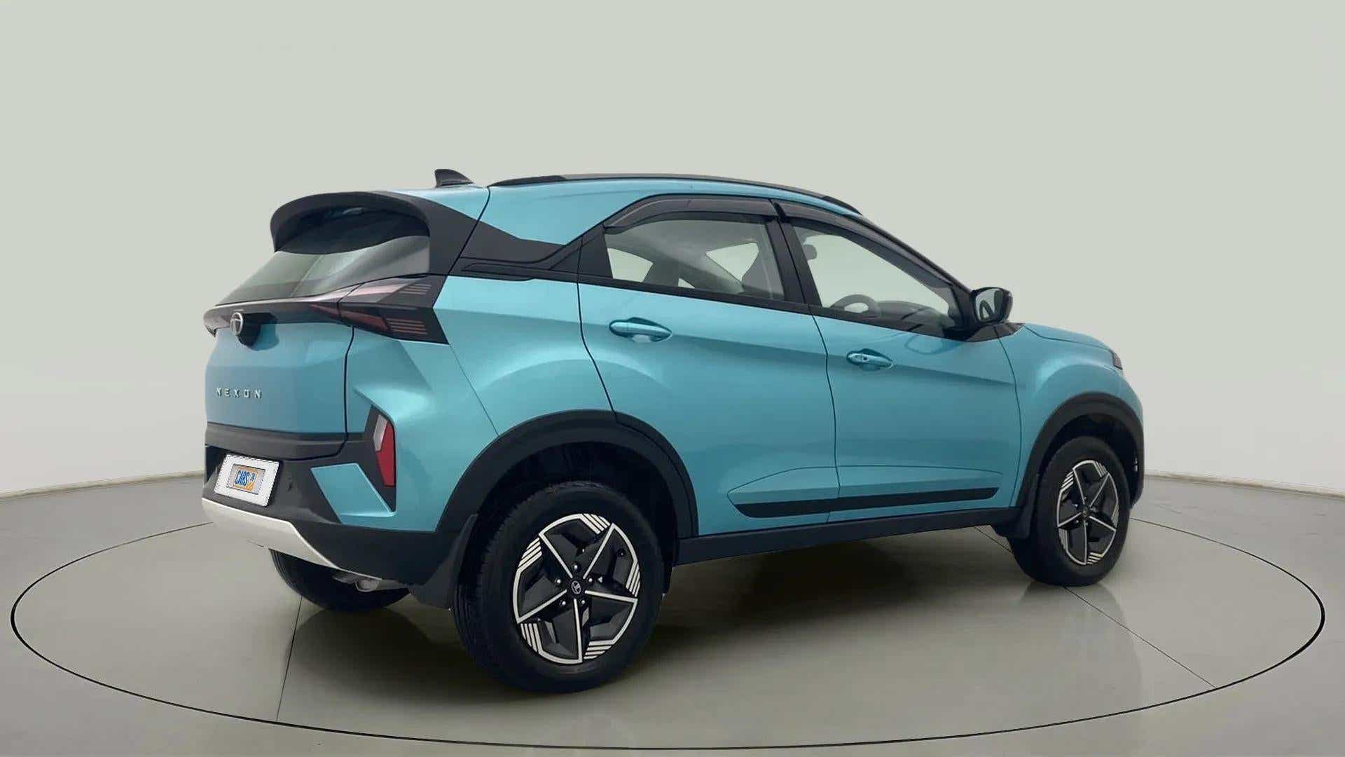 Rear three-quarter view of a Tata Nexon