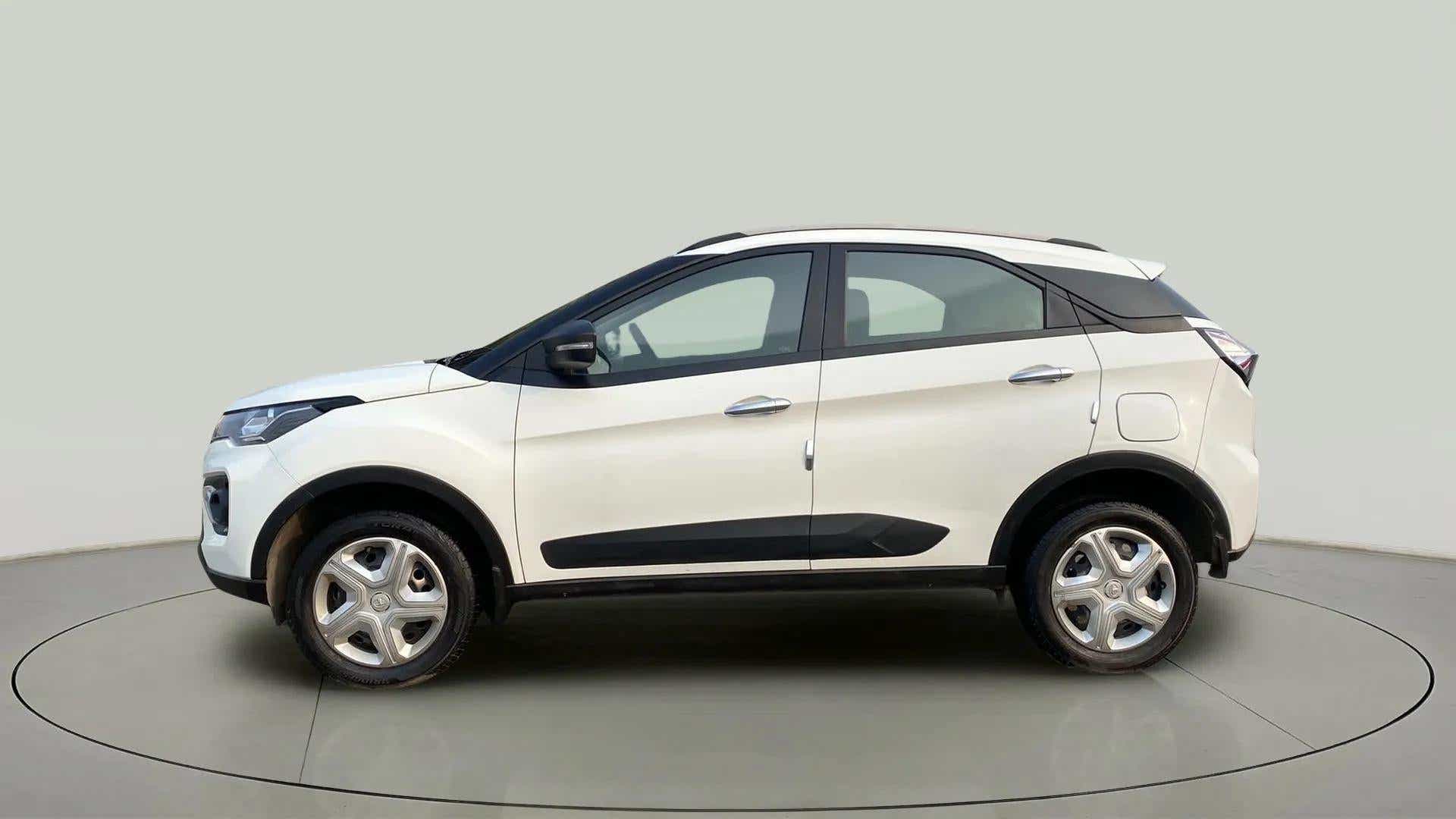Side view of a Calgary White Tata Nexon 2017-2023