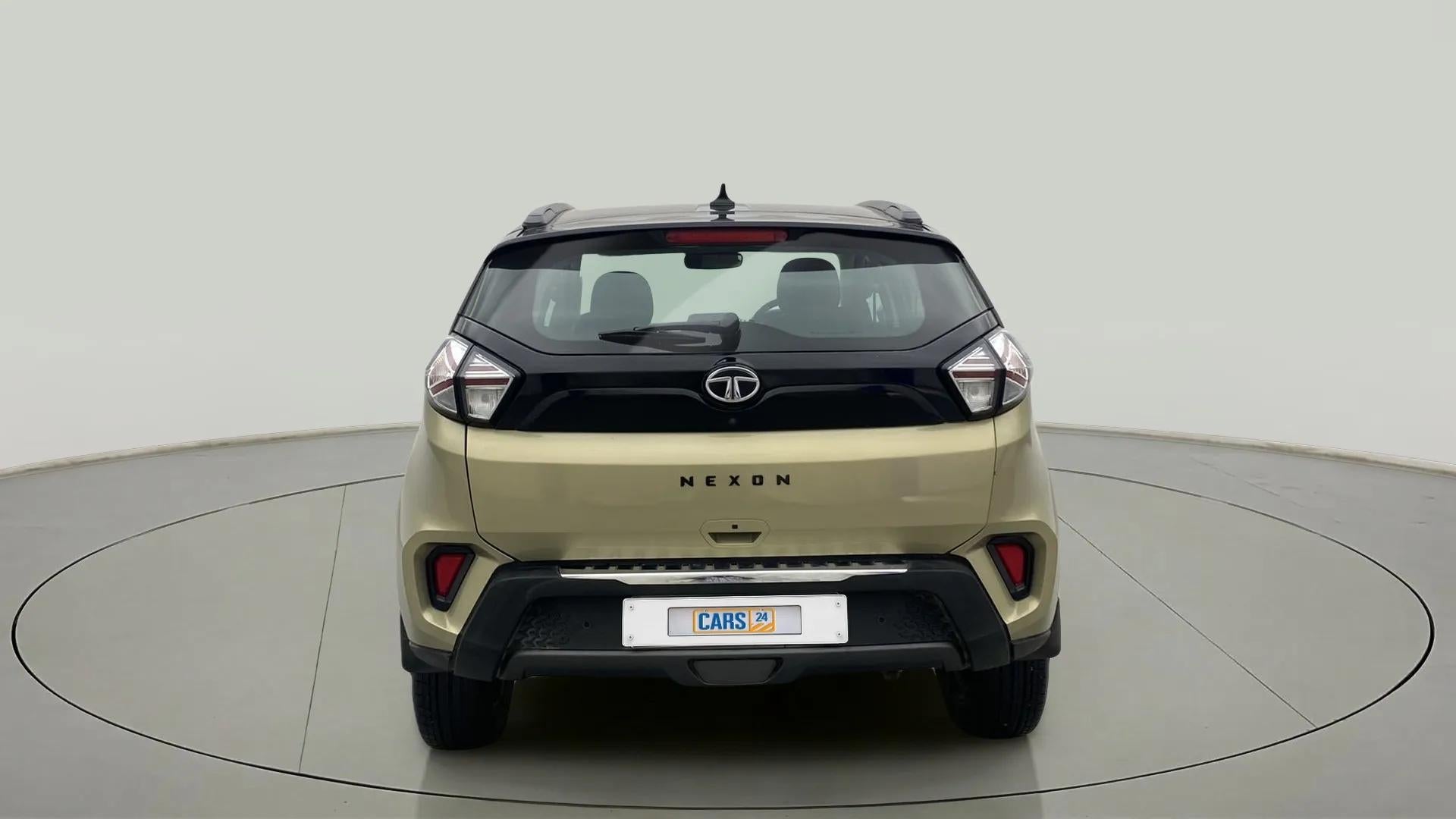 Rear view of a Grassland Beige Tata Nexon 2017-2023