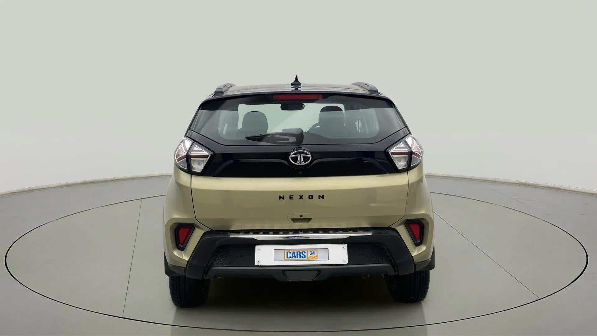 Rear view of a Grassland Beige Tata Nexon 2017-2023
