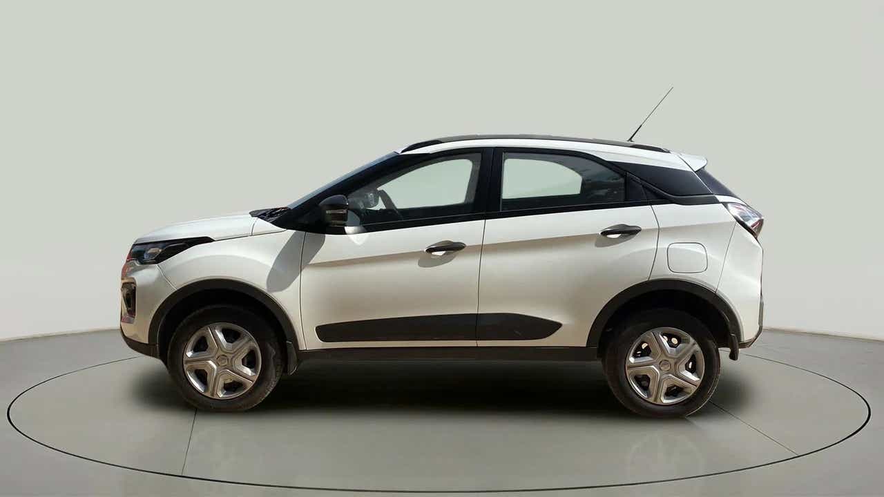 Side view of a Calgary White Tata Nexon 2017-2023
