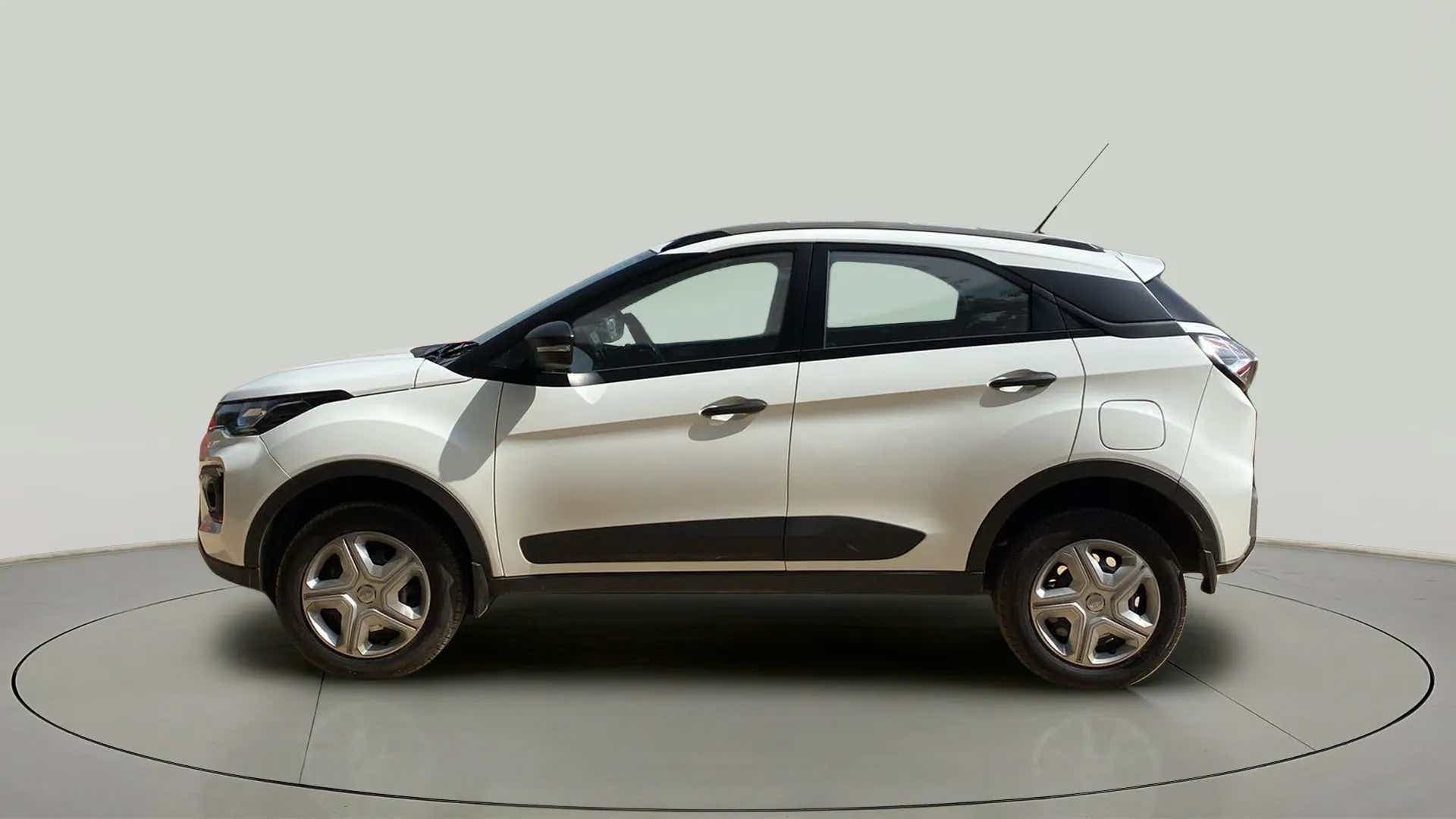 Side view of a Calgary White Tata Nexon 2017-2023