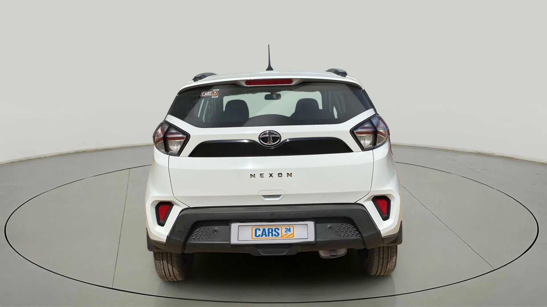 Rear view of a Calgary White Tata Nexon 2017-2023