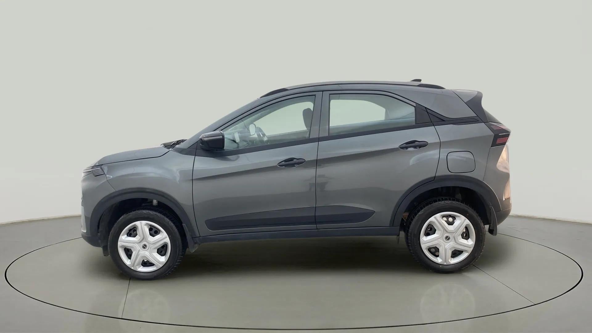 Side profile of a Pure Grey Tata Nexon