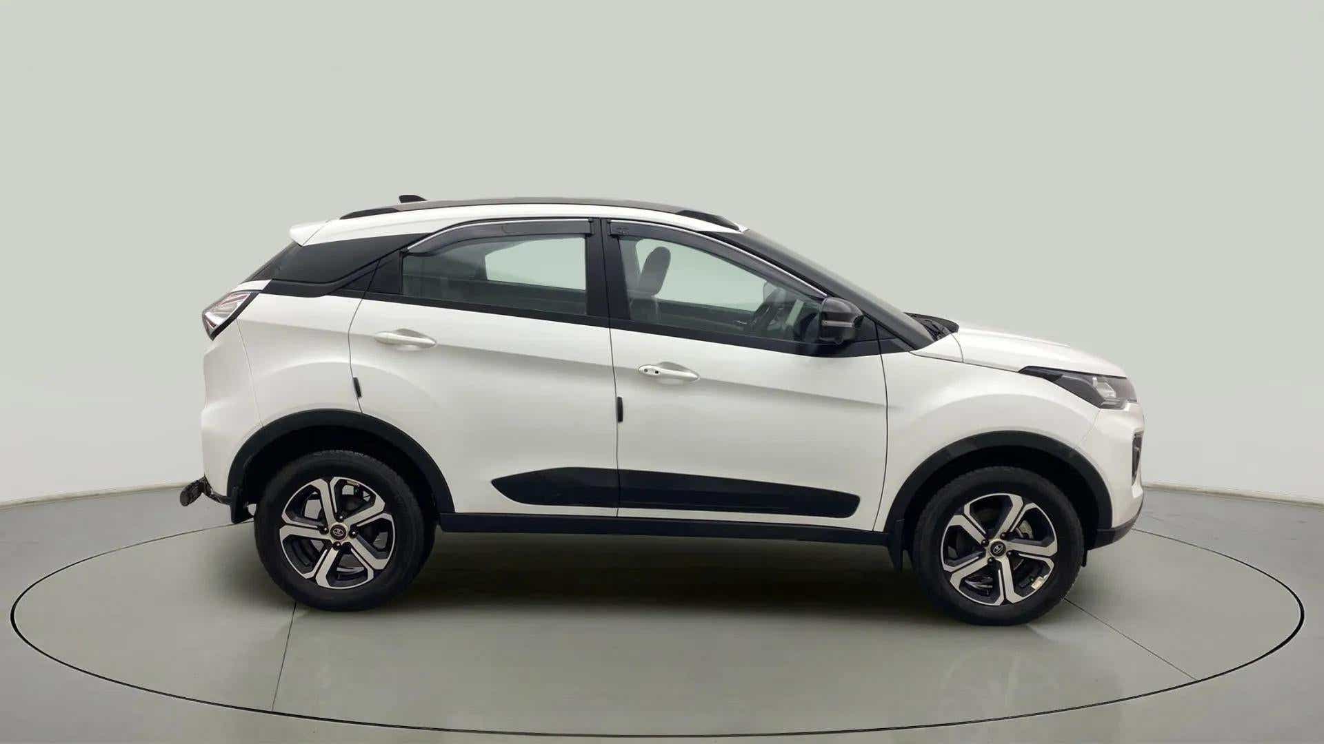 Side view of a Calgary White Tata Nexon 2017-2023