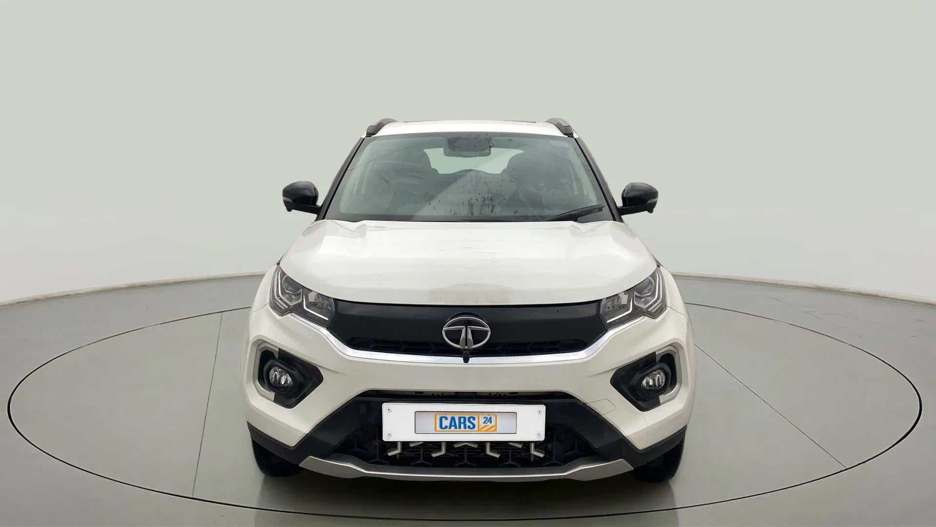Front view of a Calgary White Tata Nexon 2017-2023