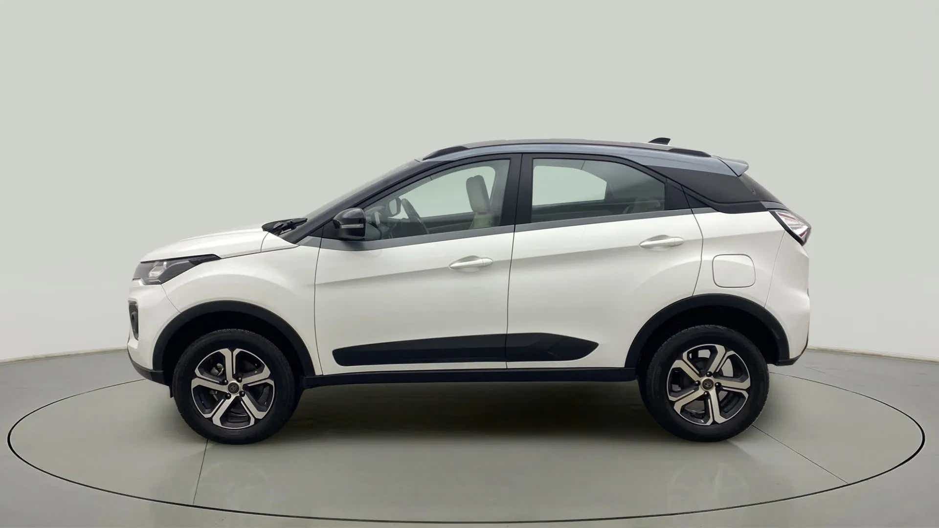 Side view of a Calgary White Tata Nexon 2017-2023
