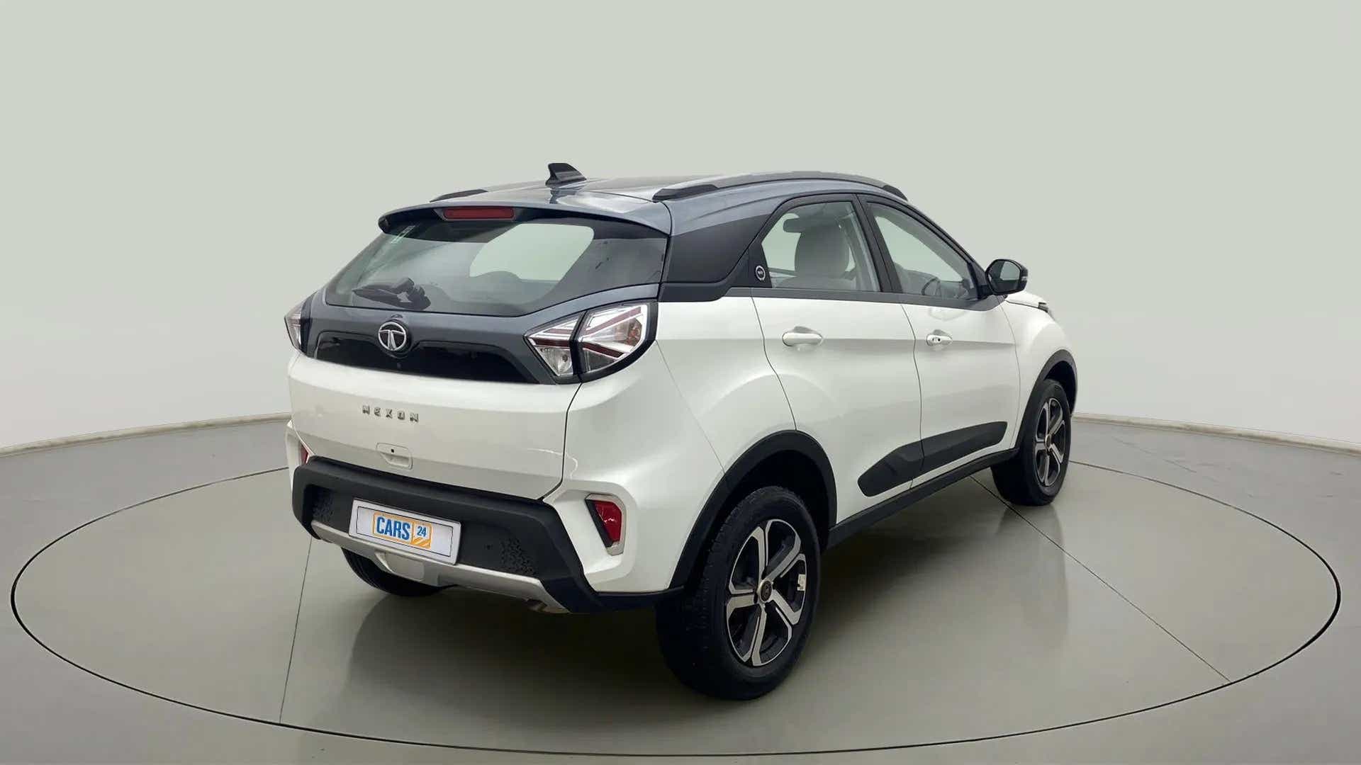 Rear three-quarter view of a Calgary White Tata Nexon 2017-2023