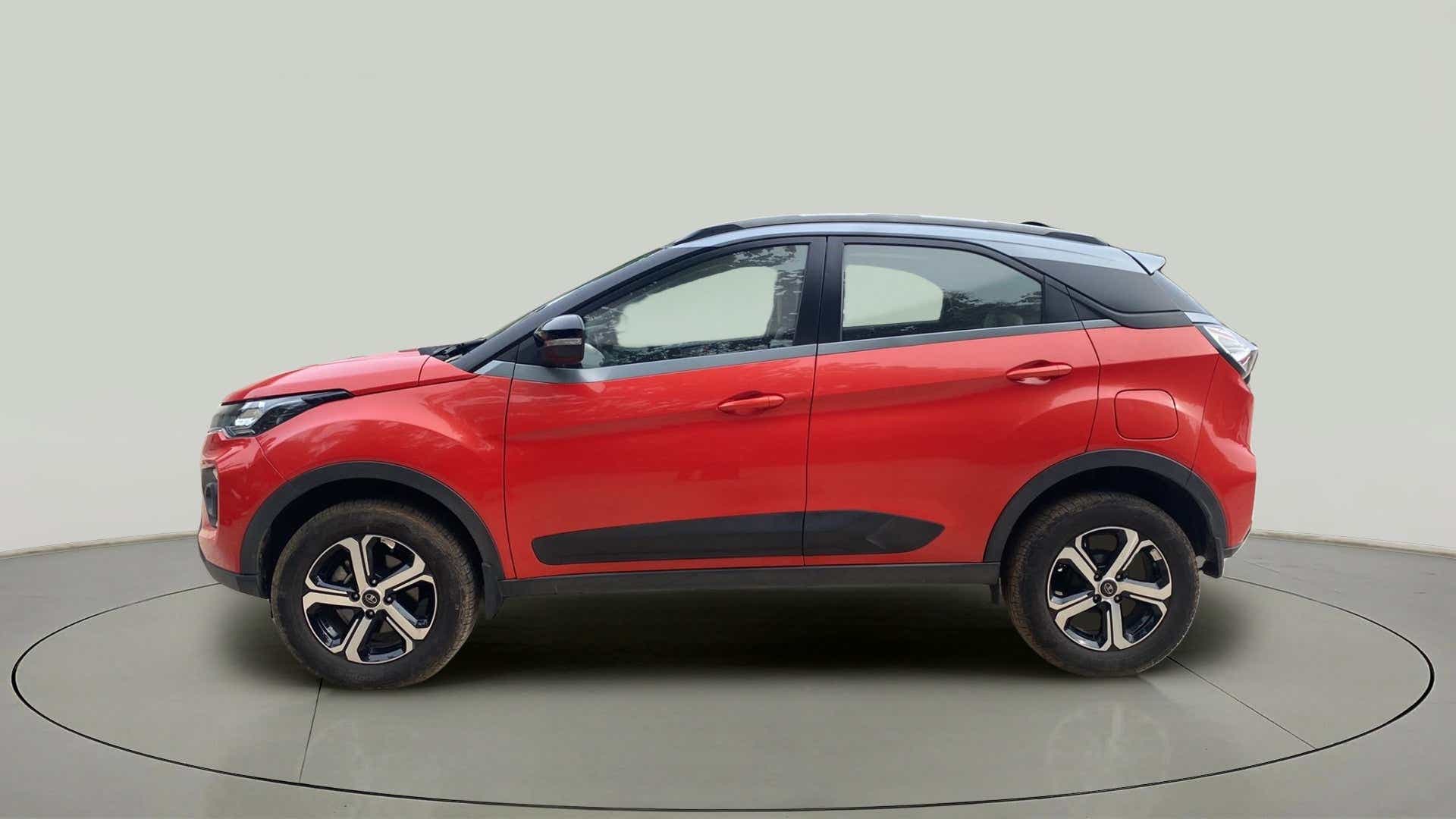 Side view of a Flame Red Tata Nexon 2017-2023