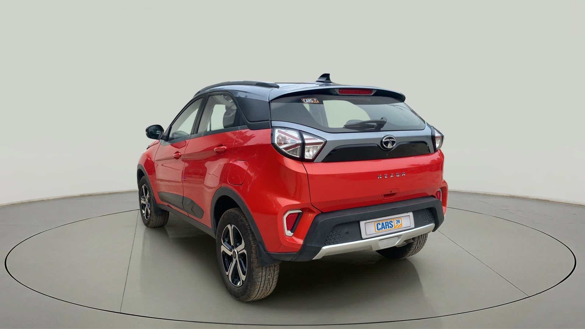 Rear three-quarter view of a Flame Red Tata Nexon 2017-2023