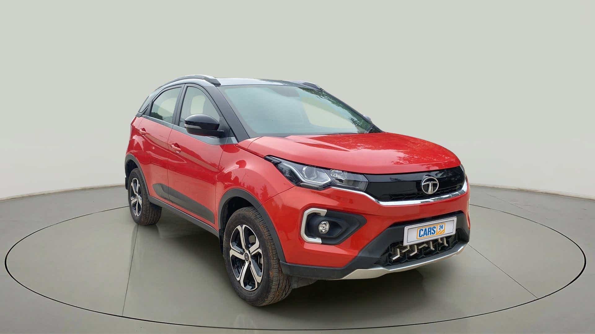 Front three-quarter view of a Flame Red Tata Nexon 2017-2023