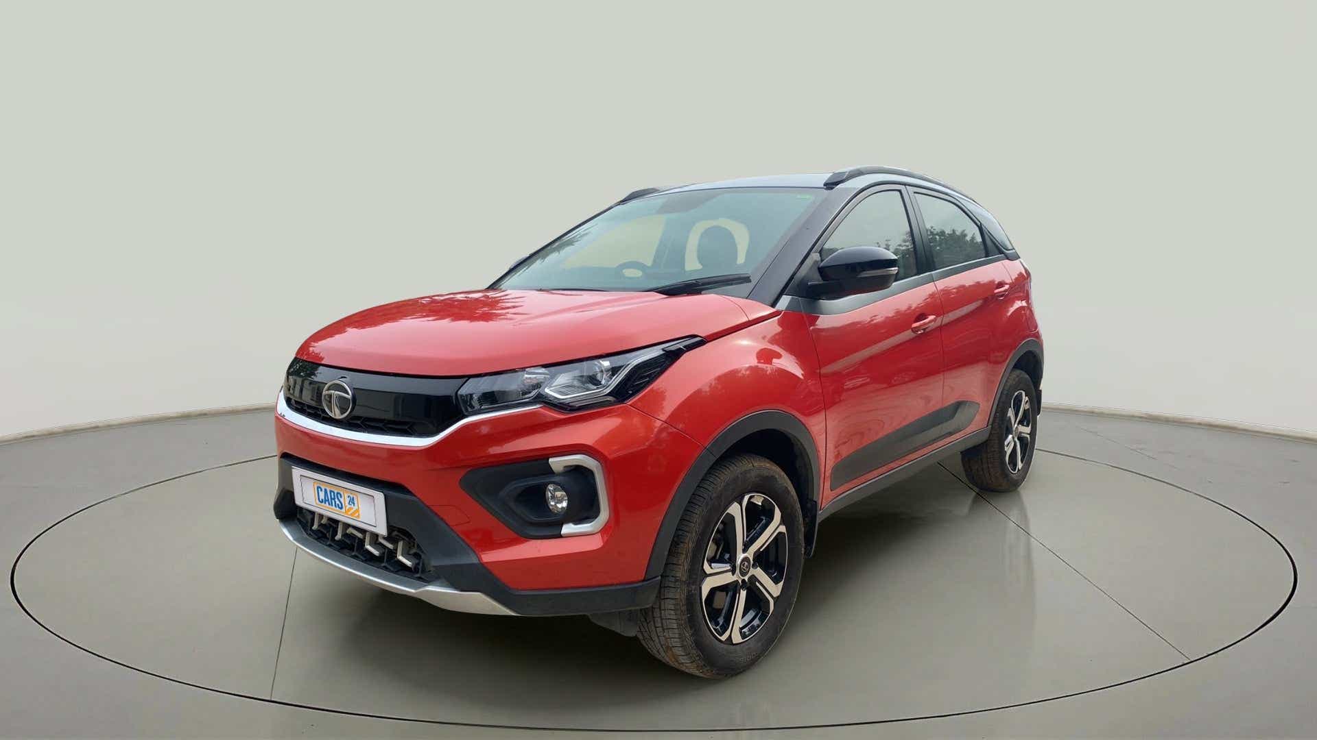 Front three-quarter view of a Flame Red Tata Nexon 2017-2023