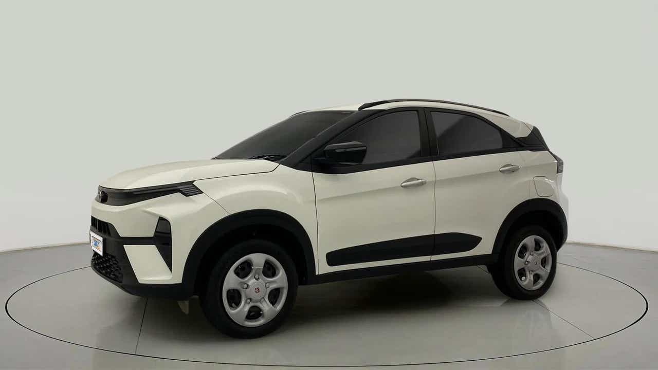 Side view of a calgary white Tata Nexon 2017-2023