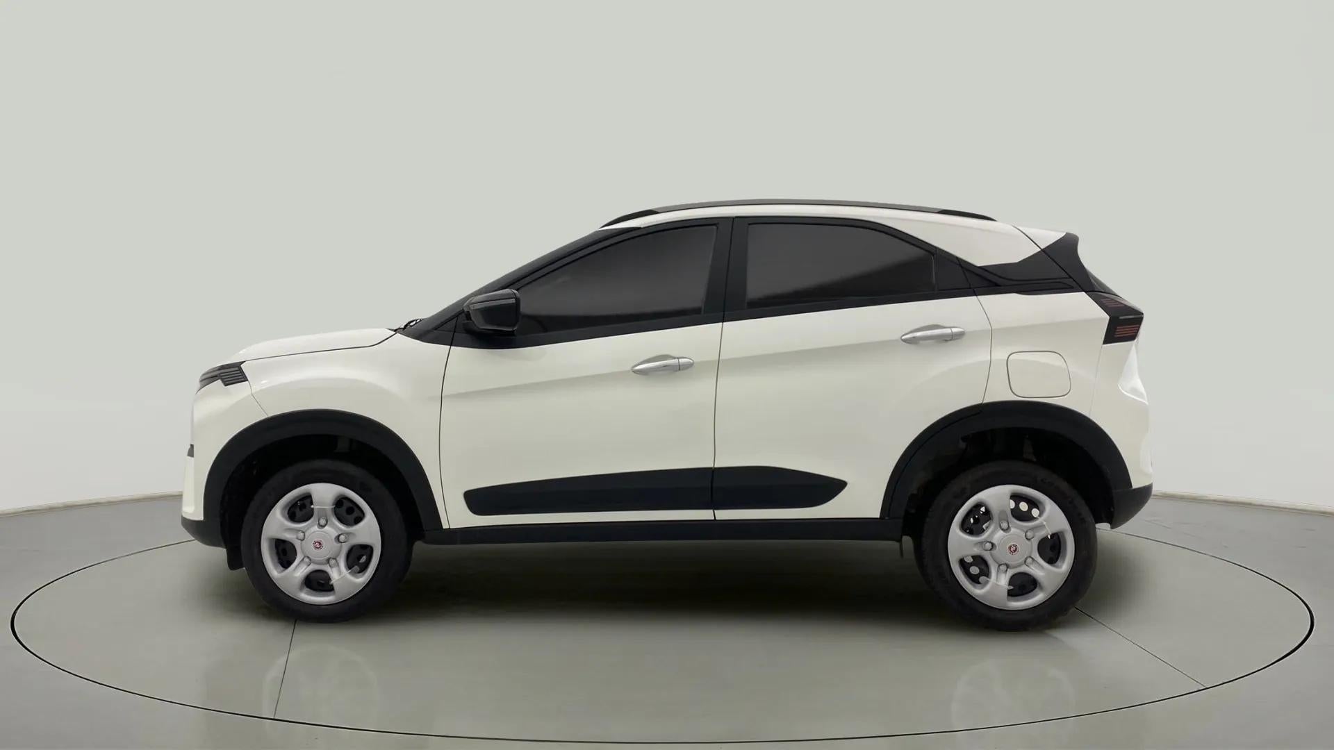 Side view of a Calgary White Tata Nexon 2017-2023