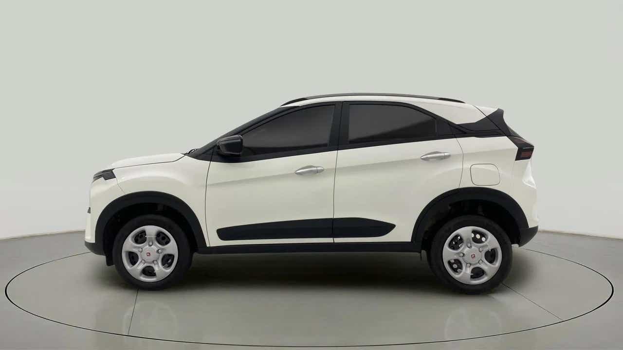 Side view of a Calgary White Tata Nexon 2017-2023