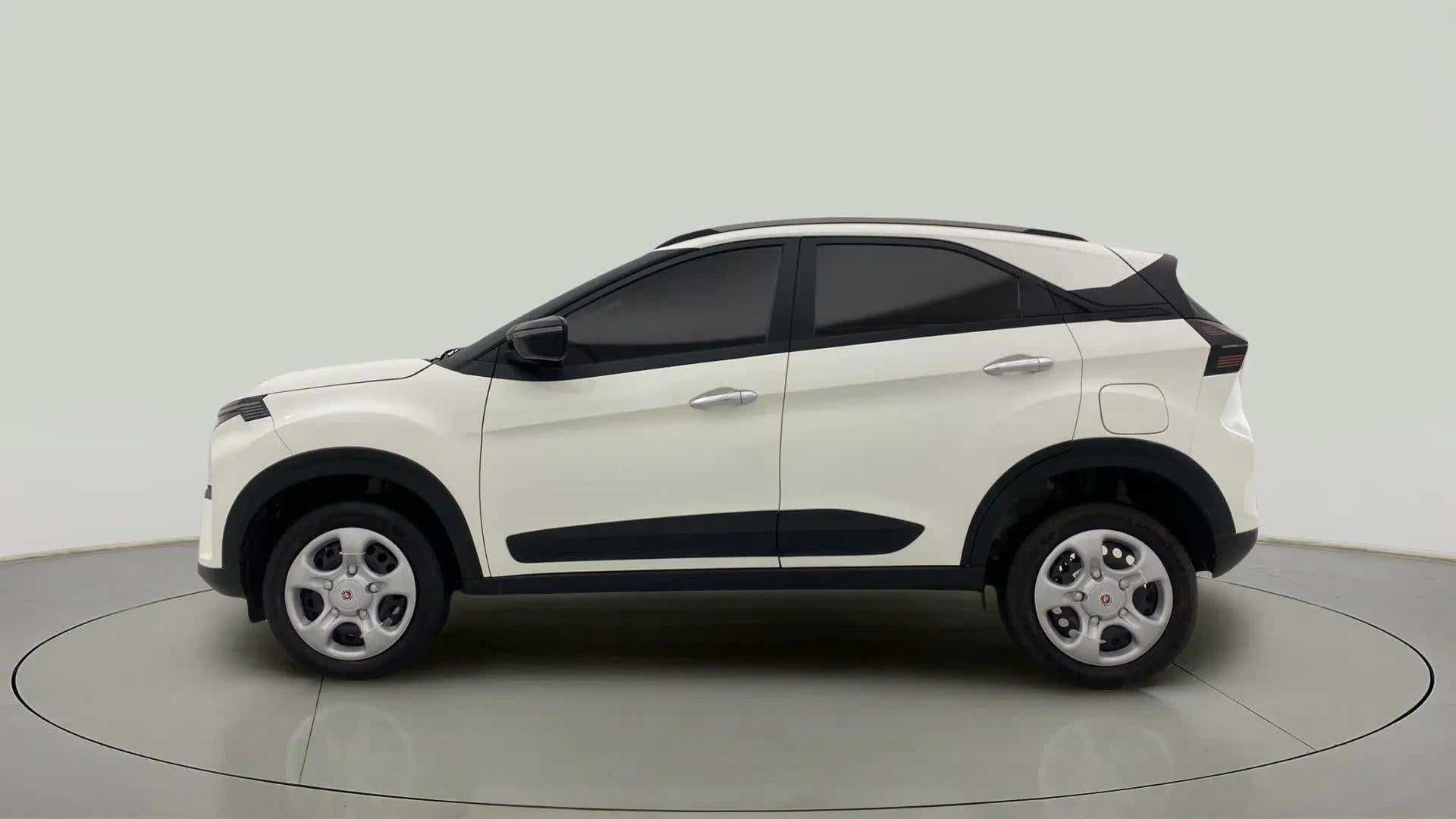 Side view of a Calgary White Tata Nexon 2017-2023