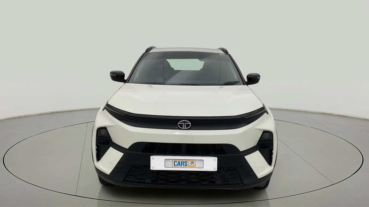 Front view of a calgary white Tata Nexon 2017-2023