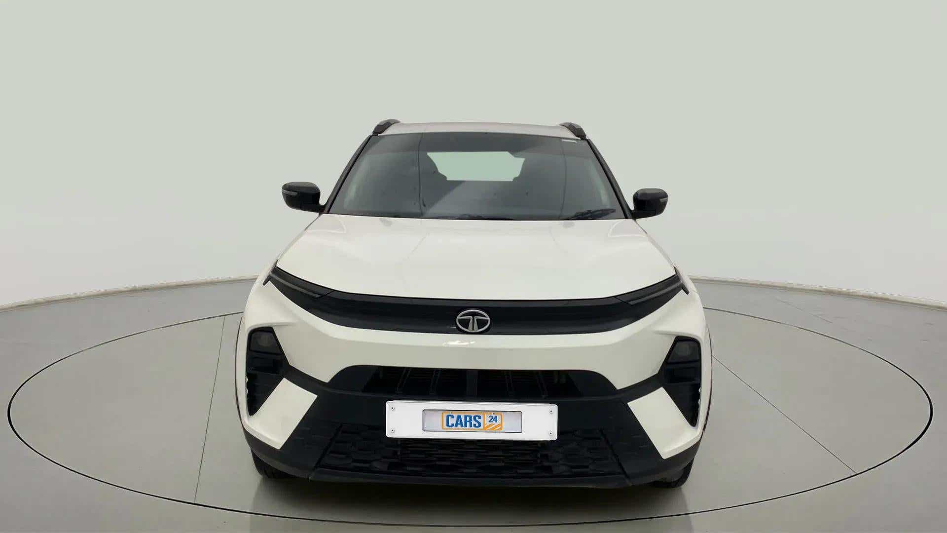 Front view of a calgary white Tata Nexon 2017-2023