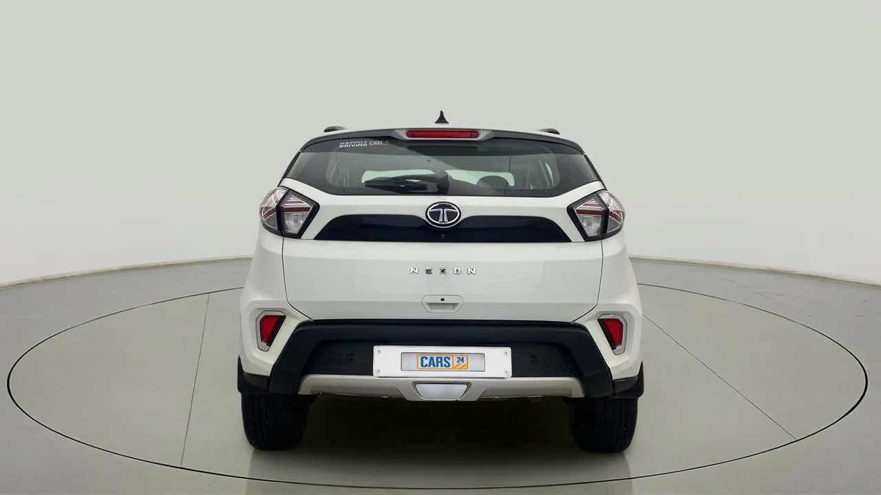 Rear view of a calgary-white Tata Nexon 2017-2023