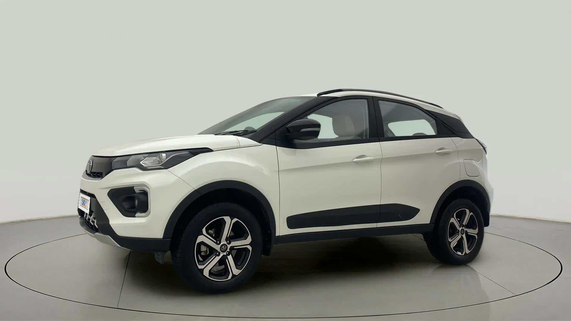 Side view of a Calgary White Tata Nexon 2017-2023
