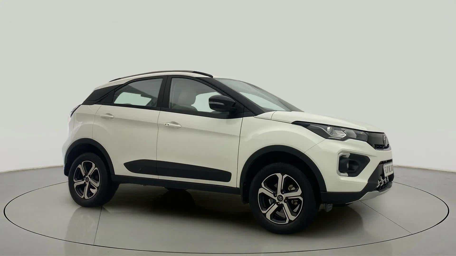 Side view of a Calgary White Tata Nexon 2017-2023