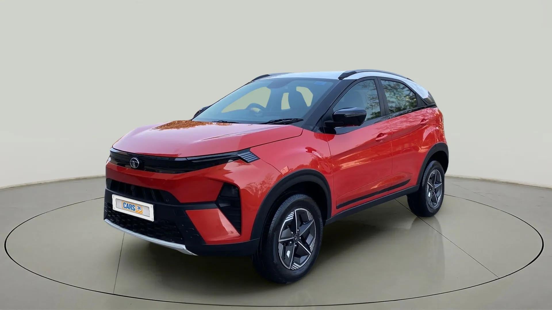 Front three-quarter view of a Flame Red Tata Nexon 2017-2023