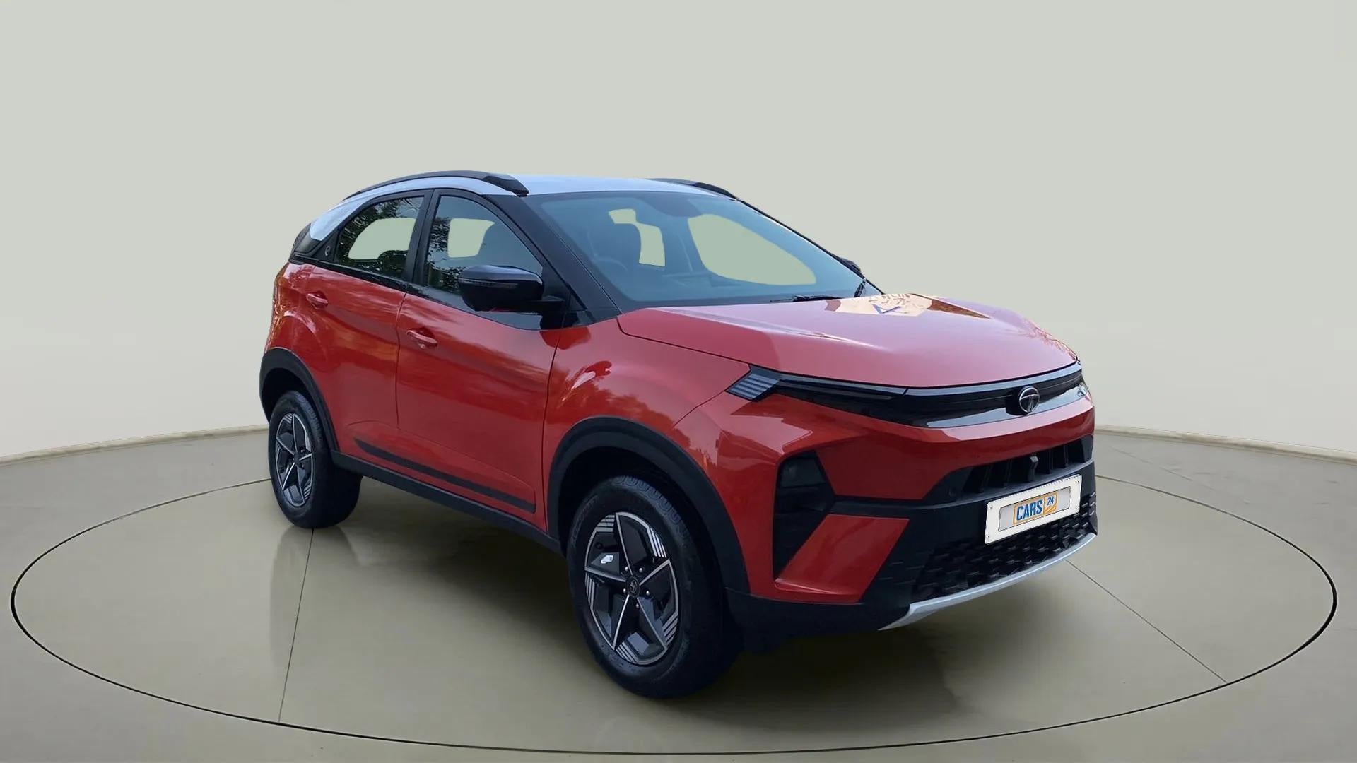 Front three-quarter view of a Flame Red Tata Nexon 2017-2023