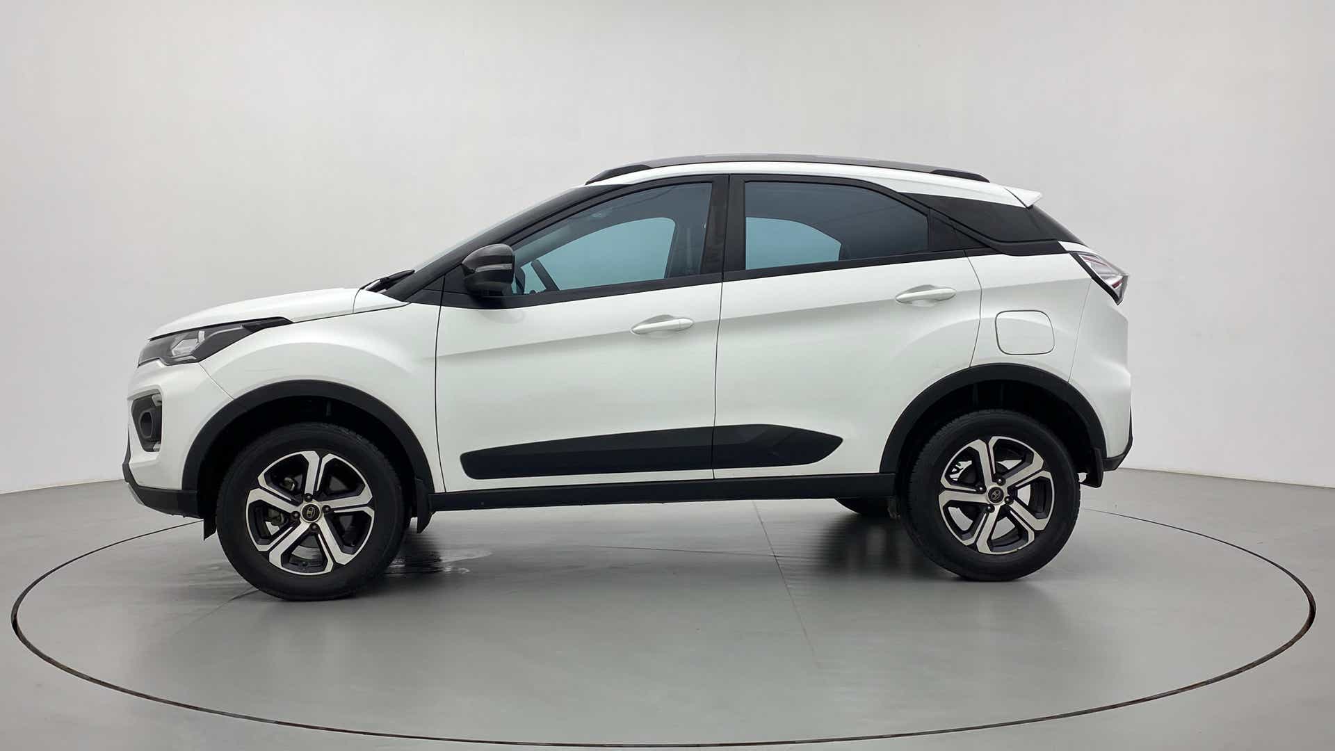 Side view of a Calgary White Tata Nexon 2017-2023