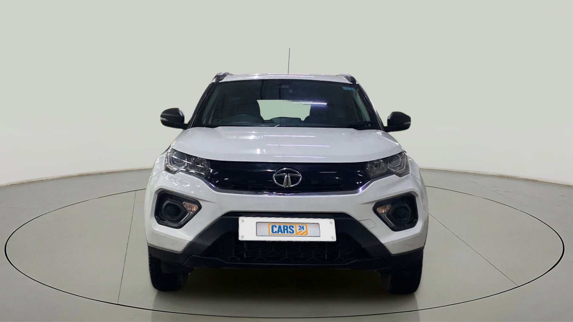 Front view of a calgary-white Tata Nexon 2017-2023