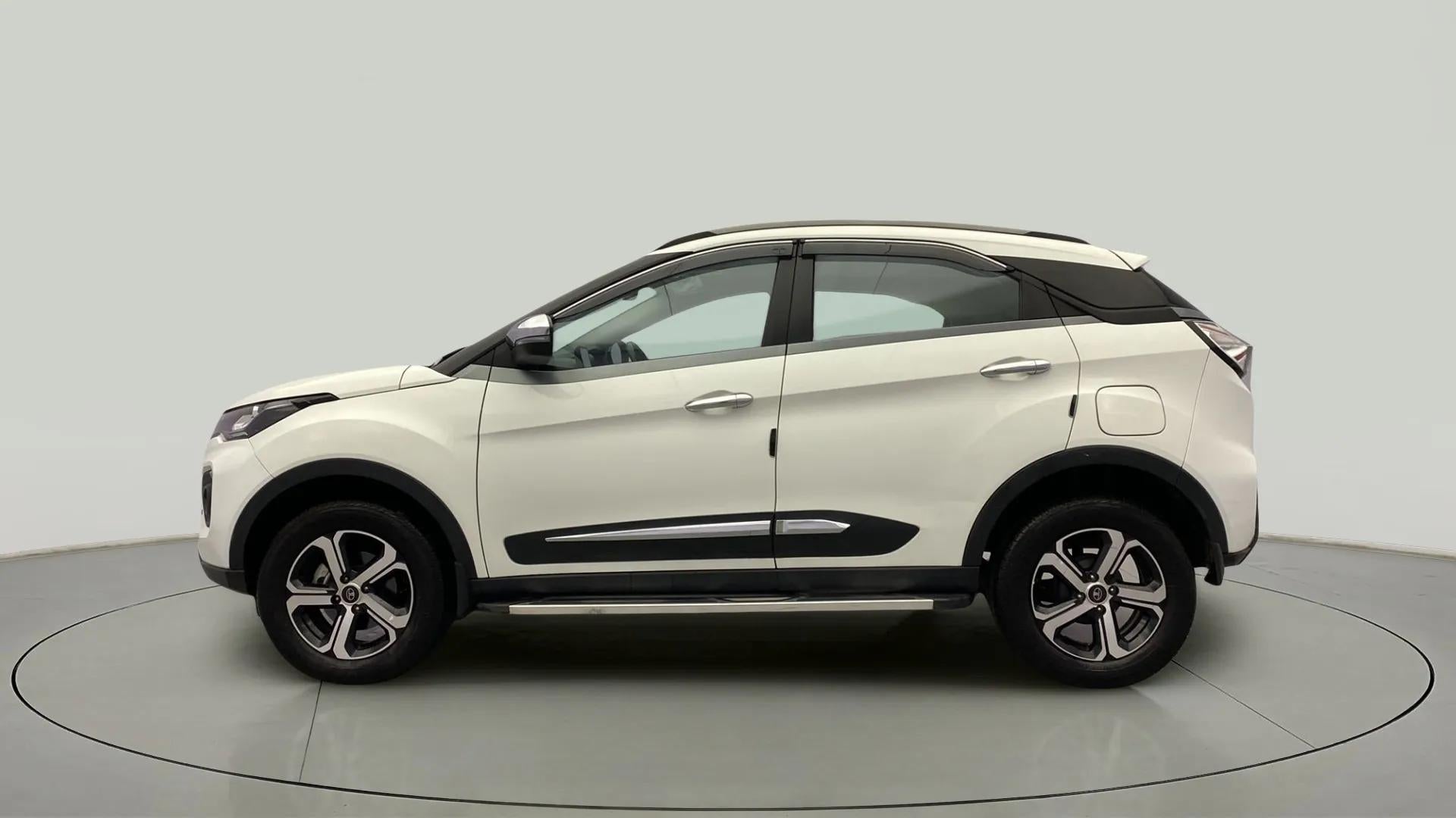 Side view of a Calgary White Tata Nexon 2017-2023