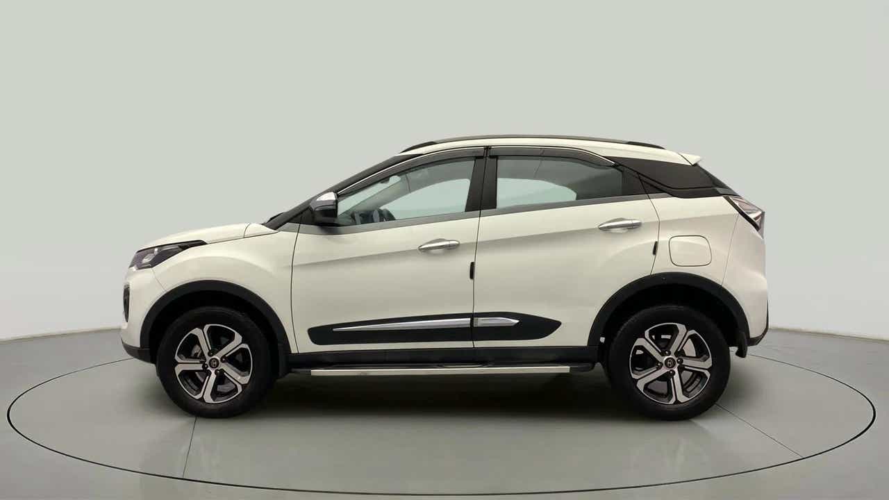 Side view of a Calgary White Tata Nexon 2017-2023