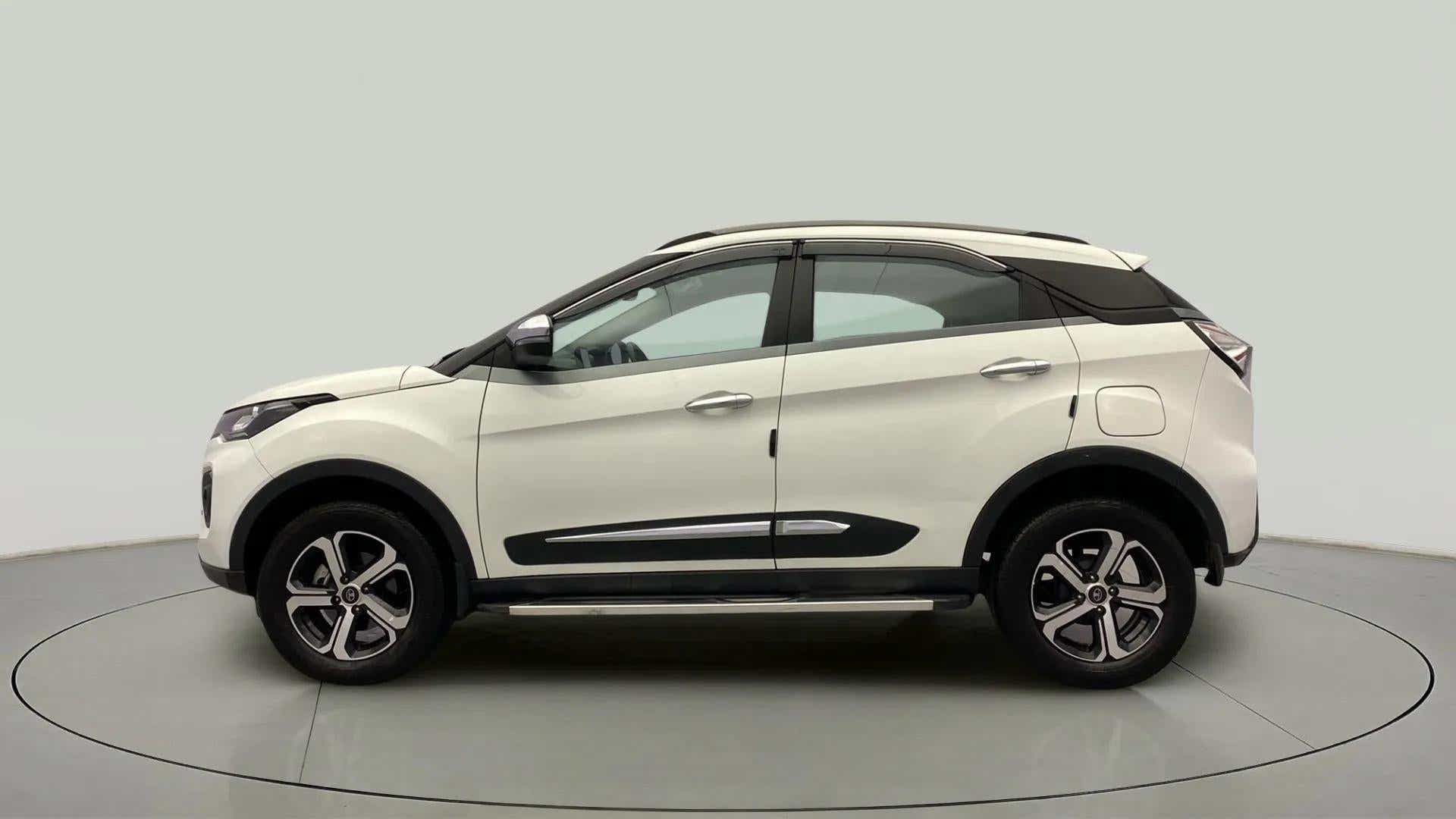 Side view of a Calgary White Tata Nexon 2017-2023