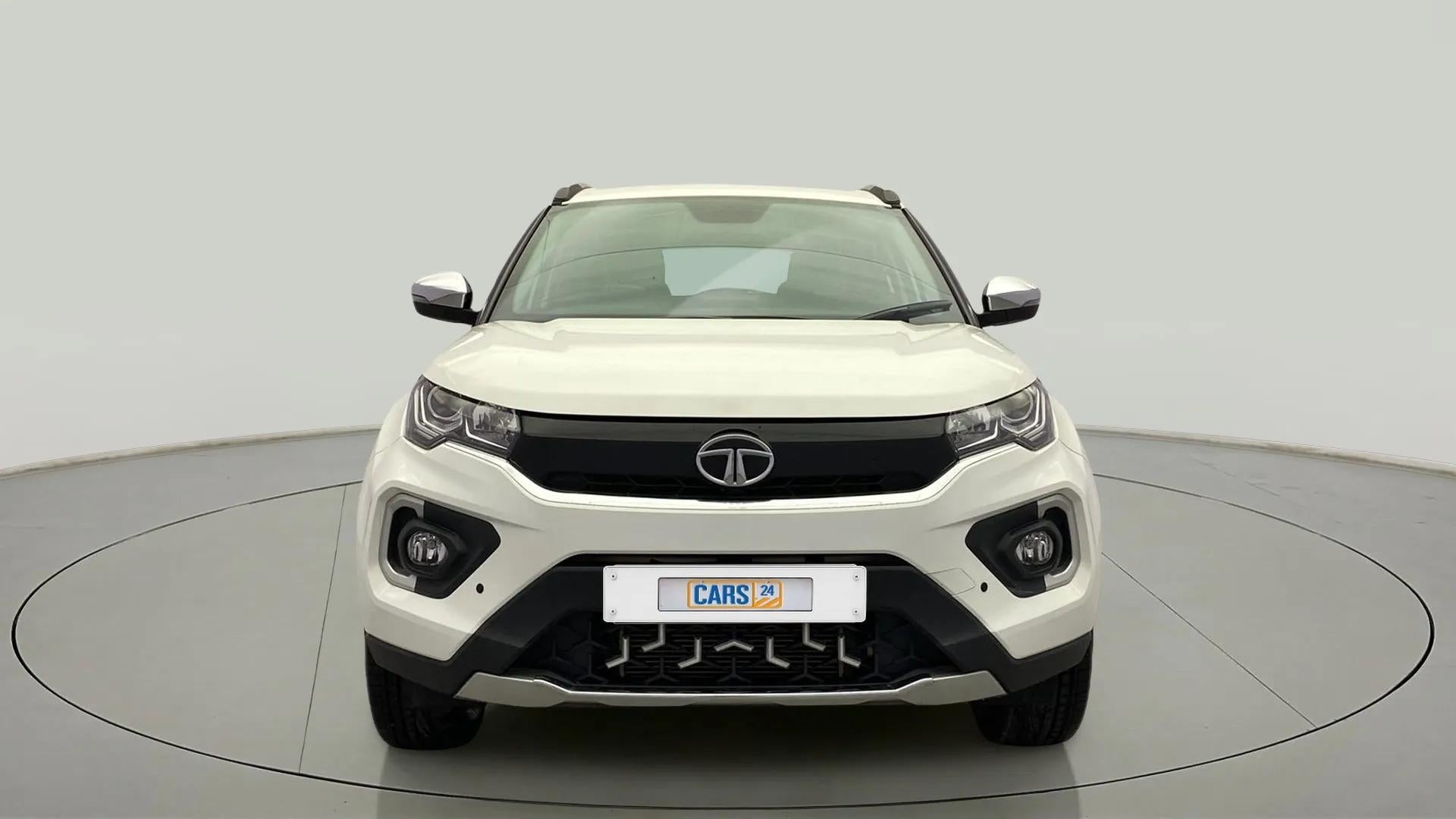 Front view of a calgary-white Tata Nexon 2017-2023