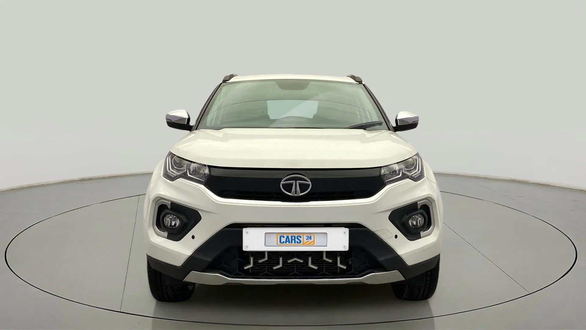 Front view of a calgary-white Tata Nexon 2017-2023