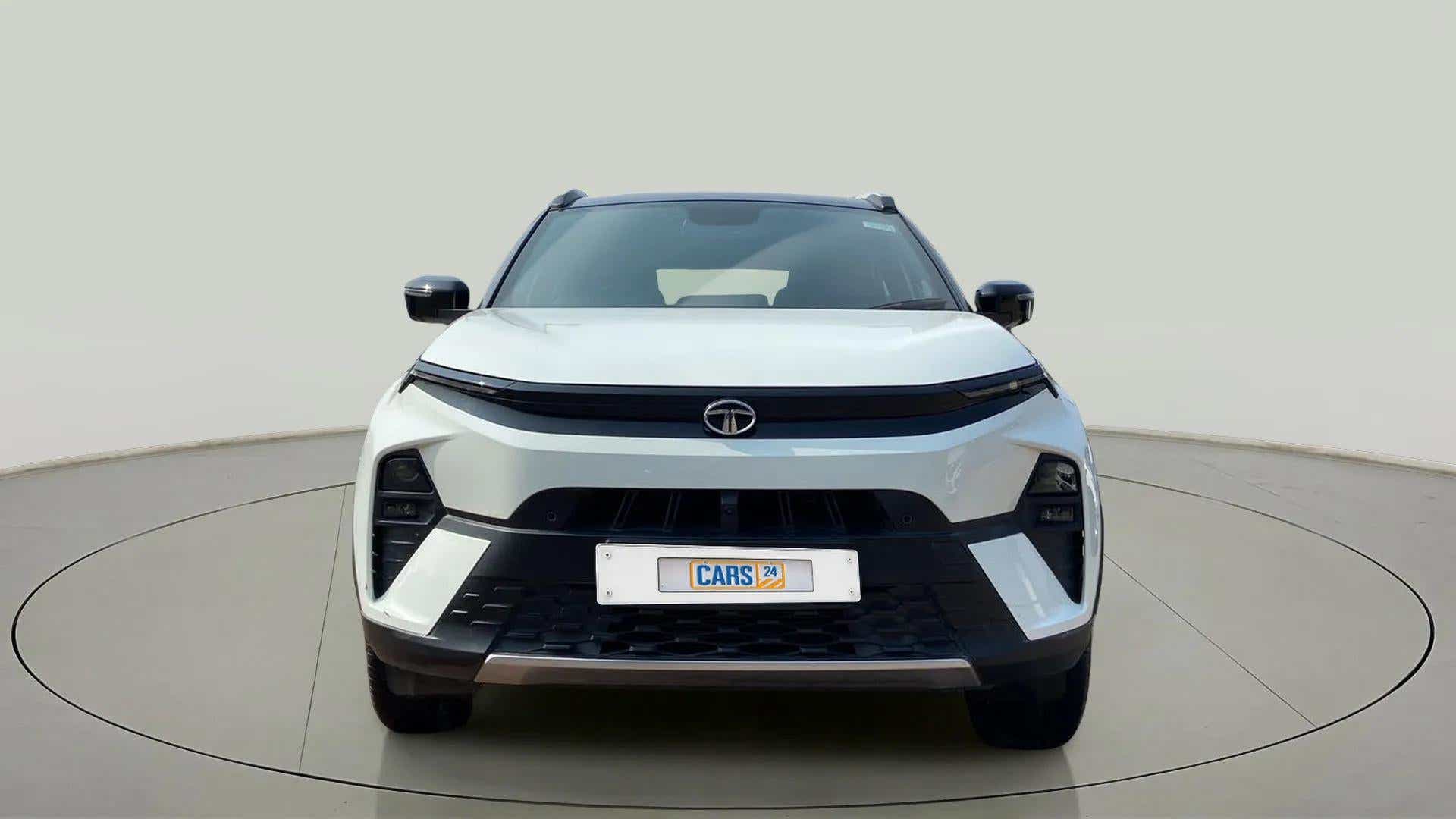 Front view of a calgary-white Tata Nexon 2017-2023