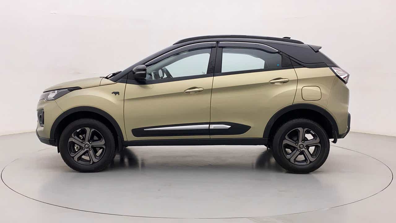 Side view of a Grassland Beige Tata Nexon 2017-2023