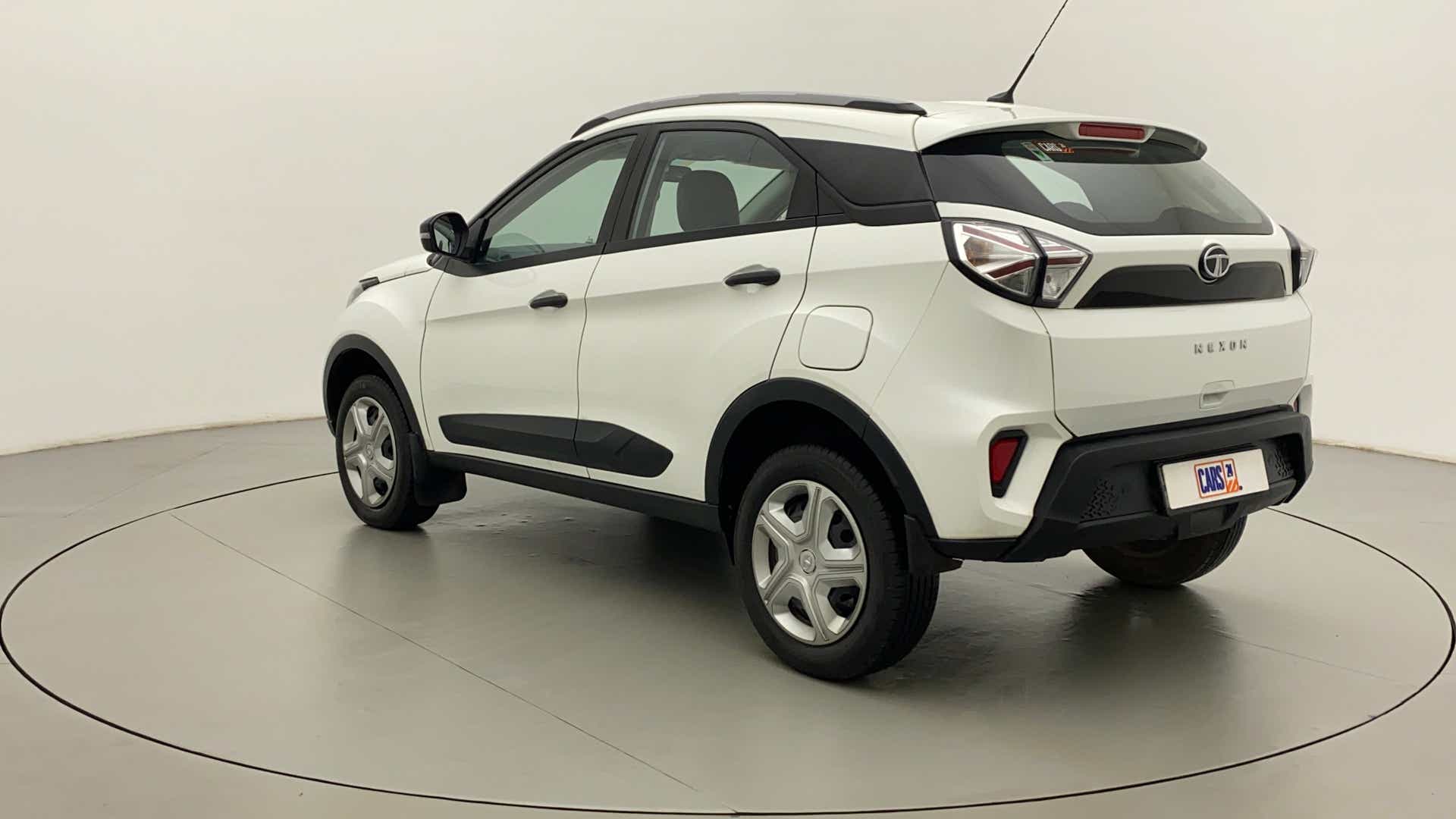 Rear three-quarter view of a calgary white Tata Nexon 2017-2023