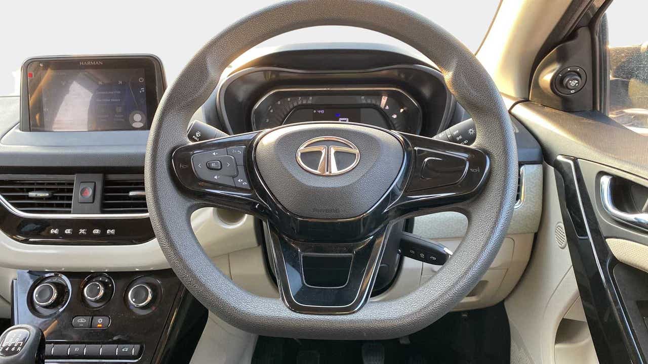 Interior dashboard and steering view of a Tata Nexon 2017-2023