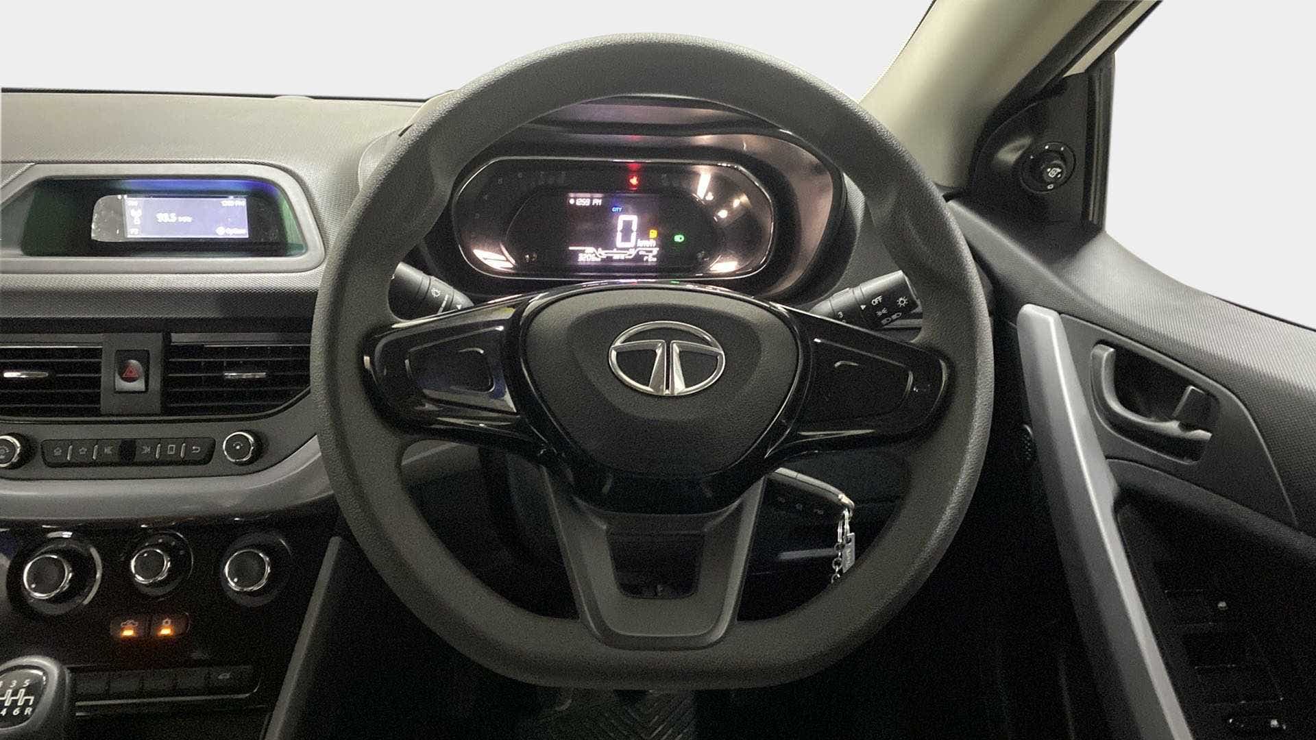 Dashboard and steering wheel view of a Tata Nexon 2017-2023