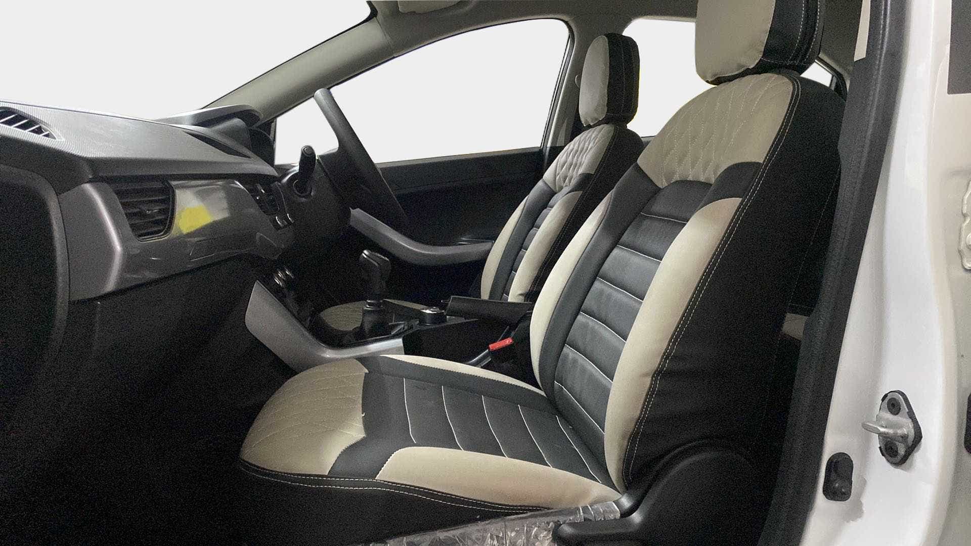 Front seats and dashboard view of a Tata Nexon 2017-2023