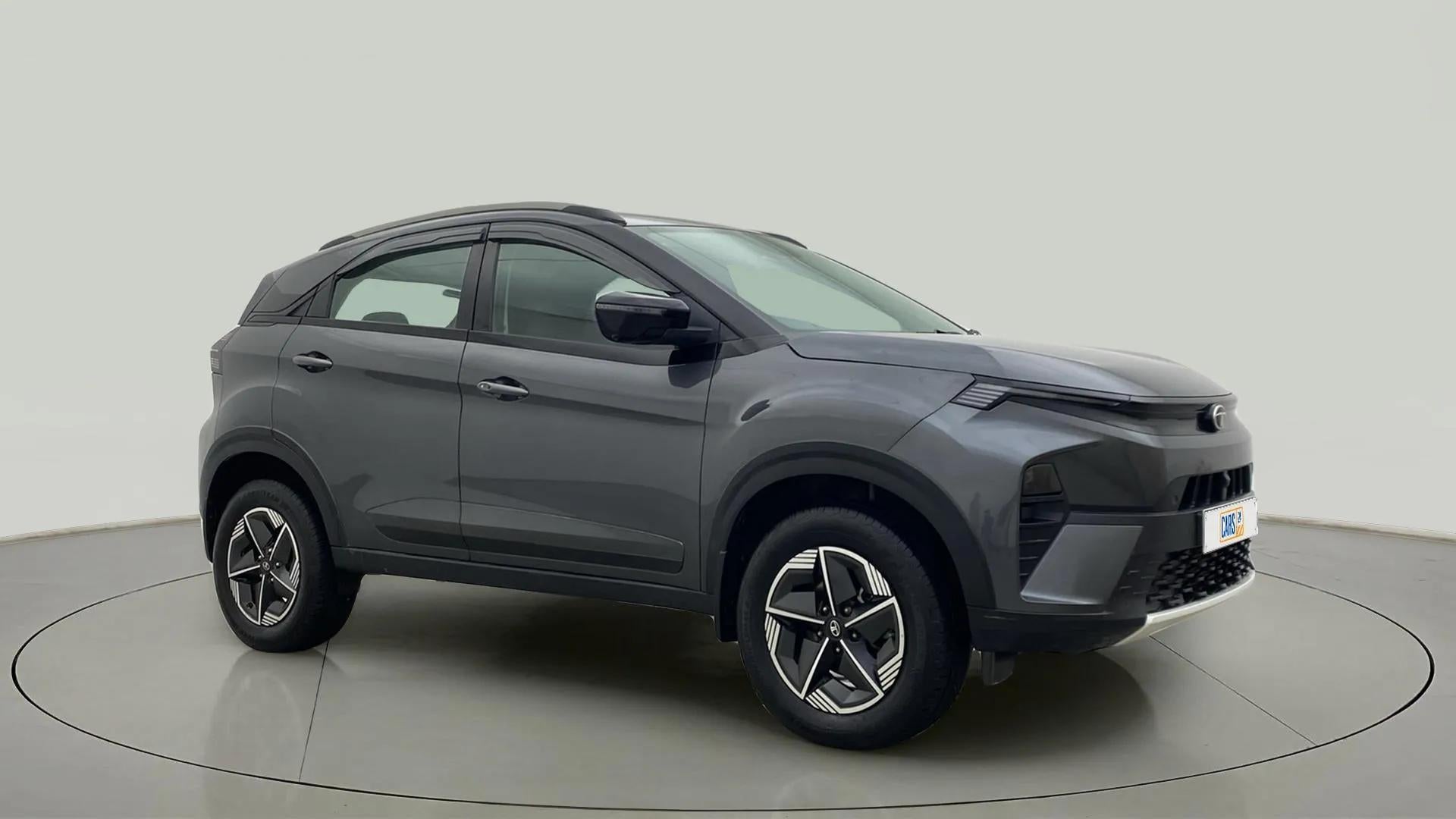 Front side view of a Pure Grey Tata Nexon