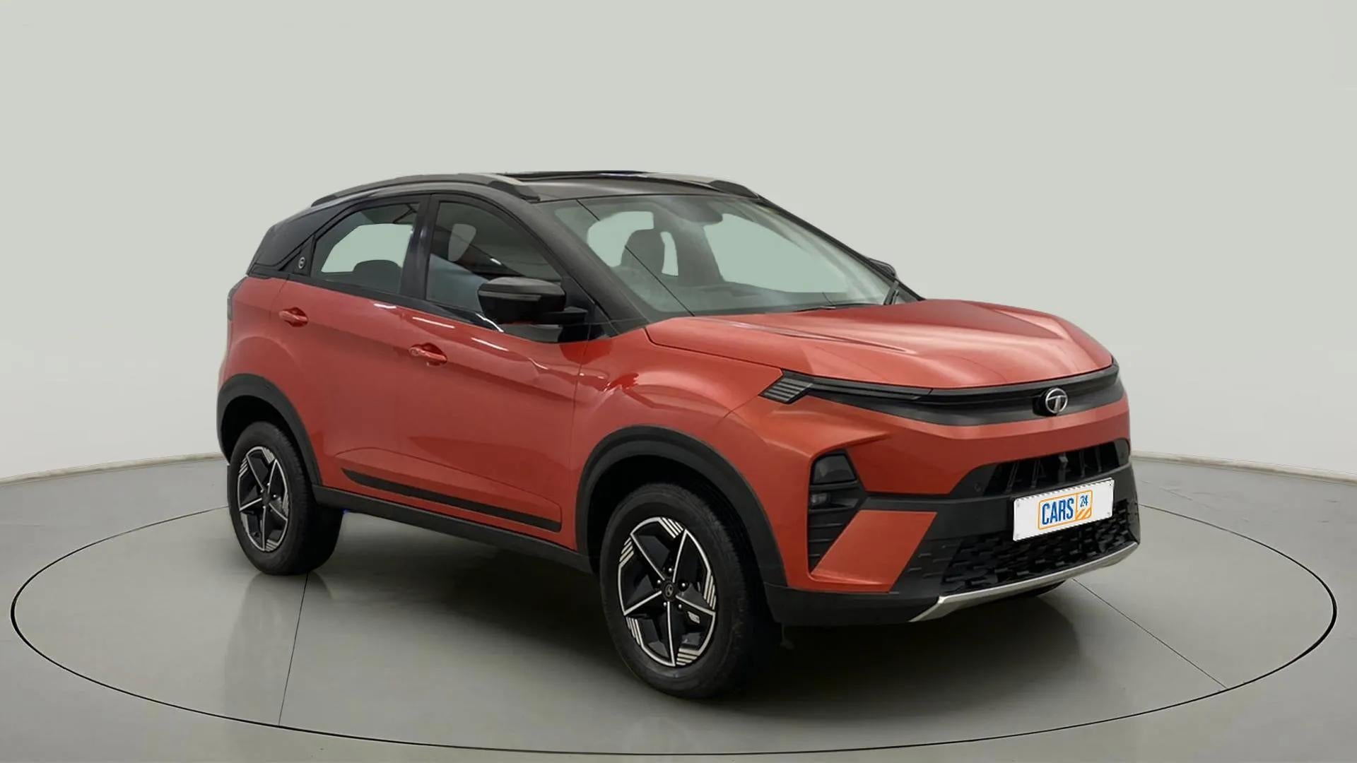 Front three-quarter of a flame red Tata Nexon 2017-2023