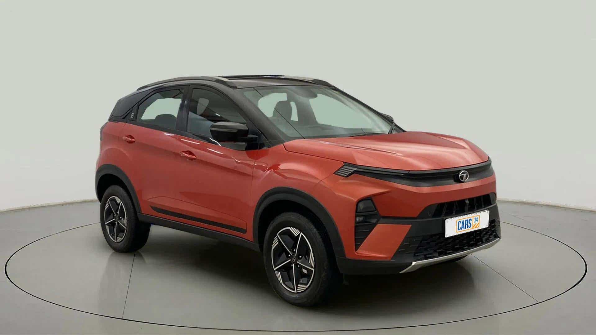 Front three-quarter of a flame red Tata Nexon 2017-2023