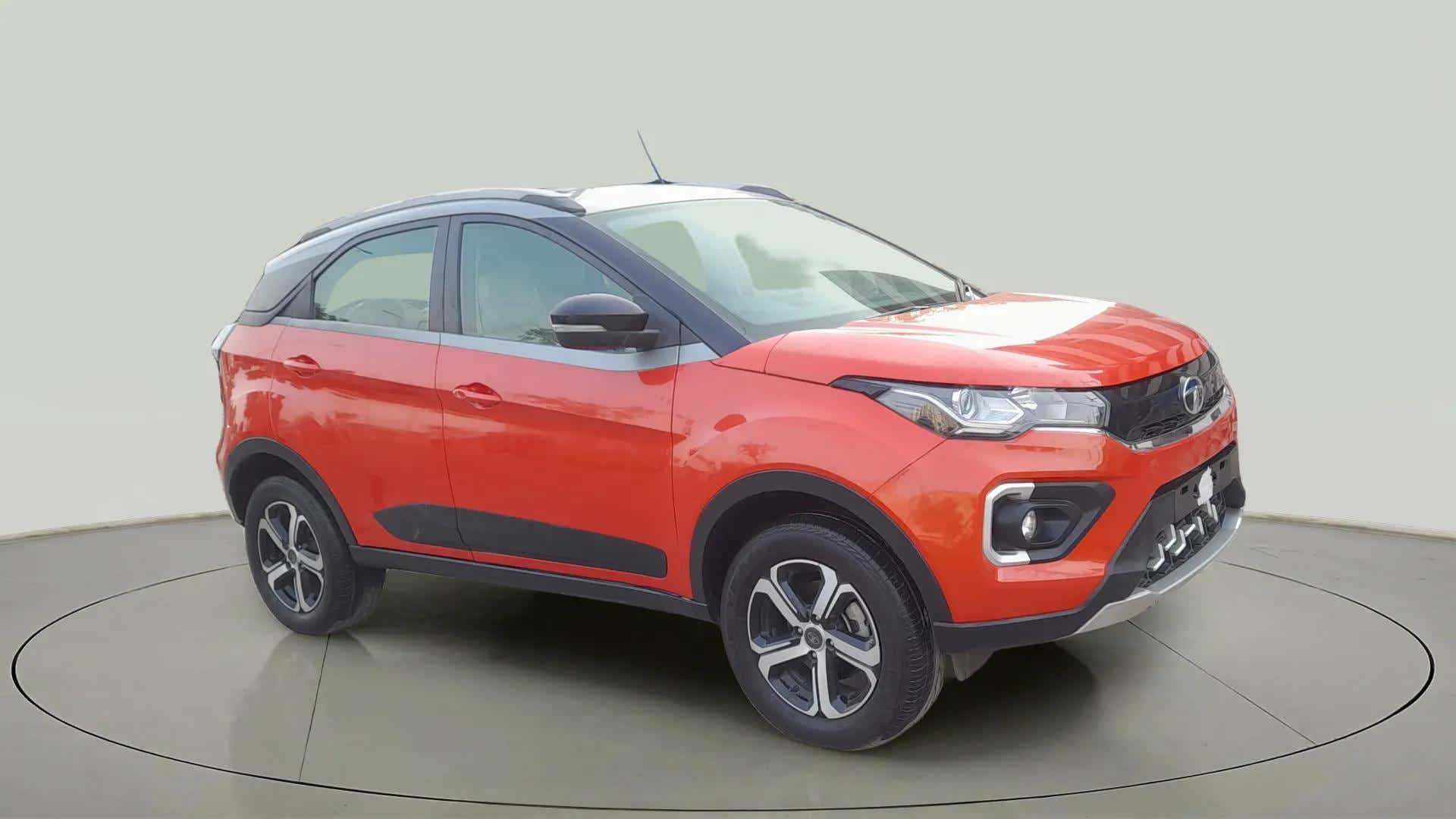 Front three-quarter view of a Flame Red Tata Nexon 2017-2023