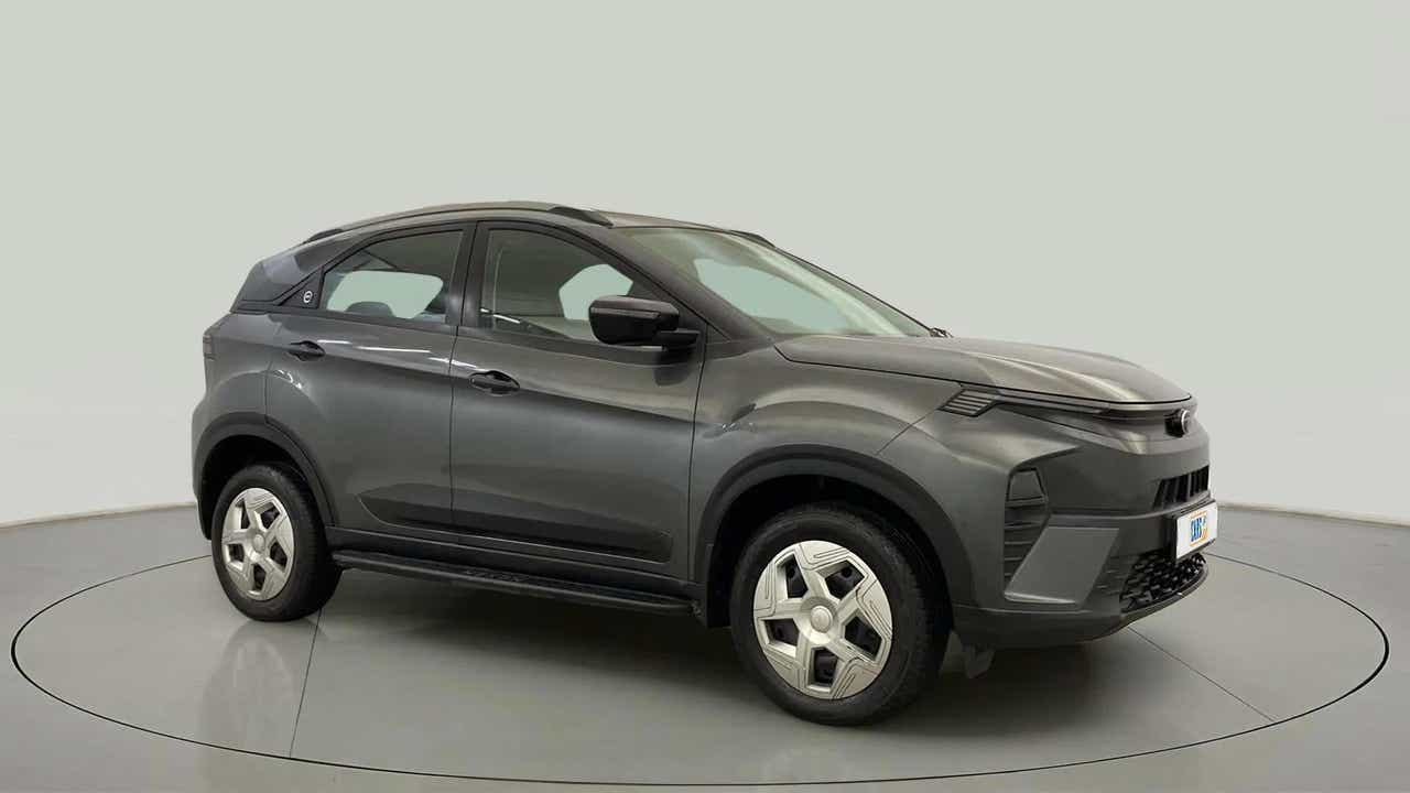 Front side view of a daytona-grey Tata Nexon