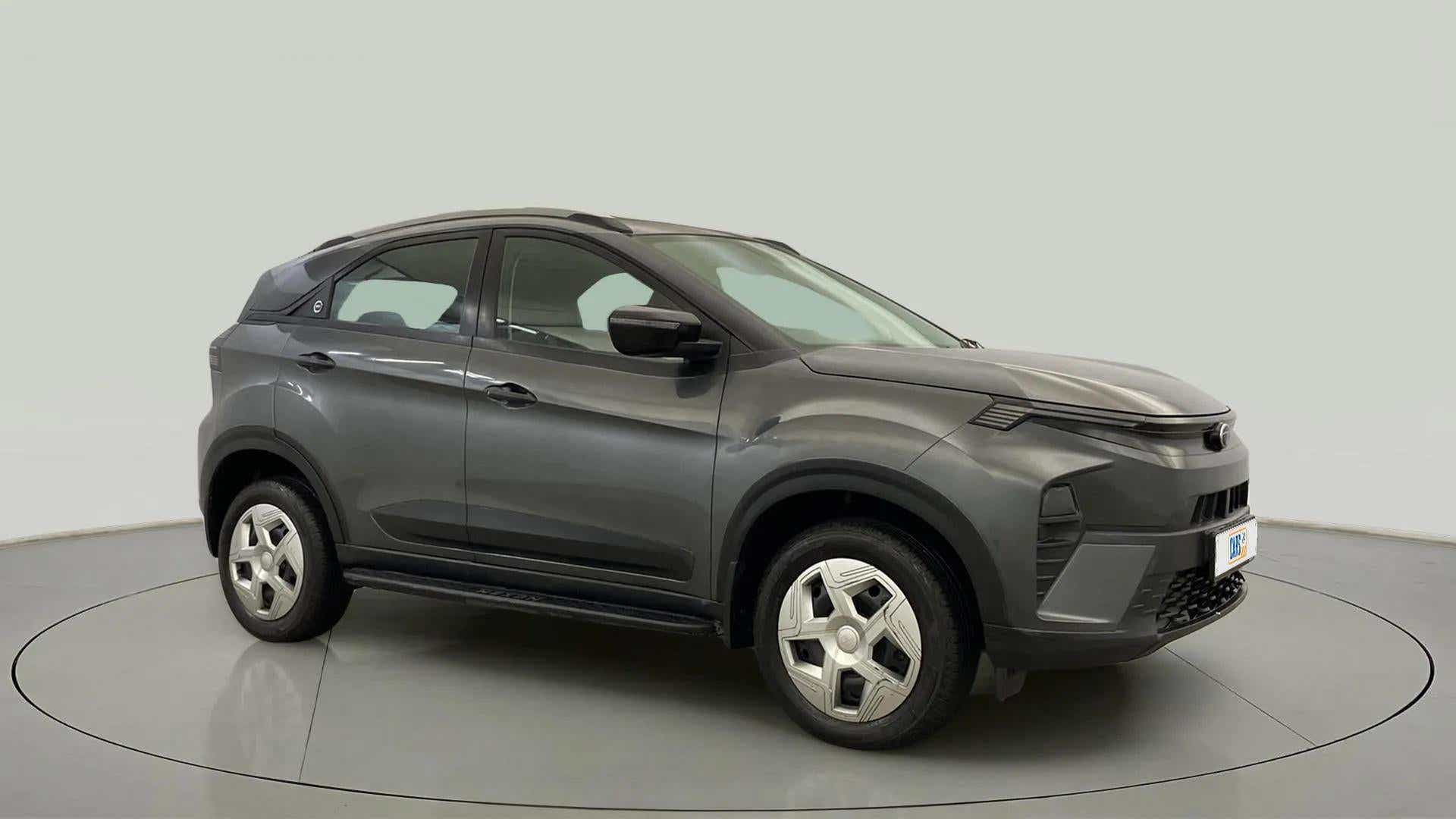 Front side view of a daytona-grey Tata Nexon