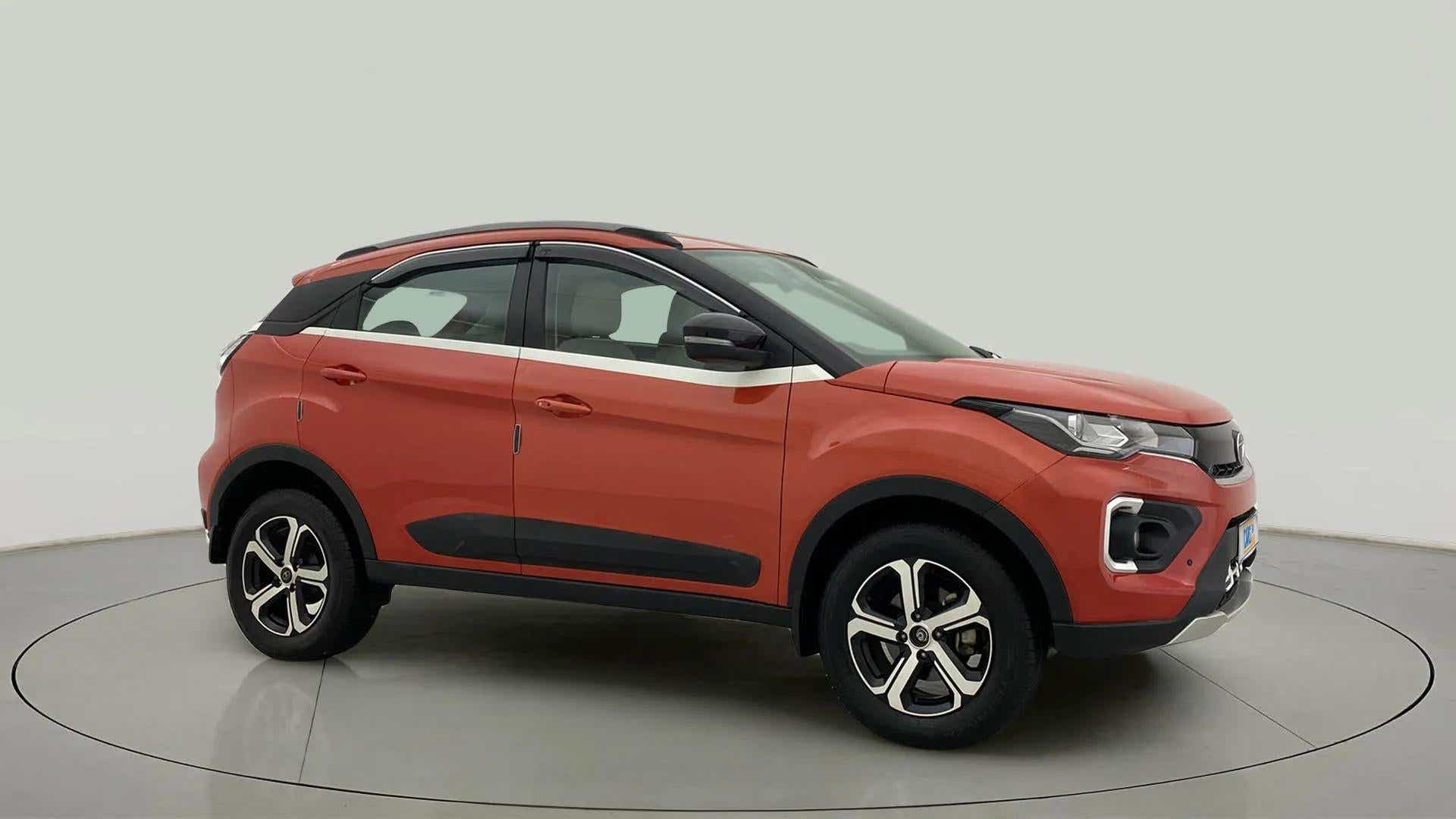 Side view of a Flame Red Tata Nexon 2017-2023