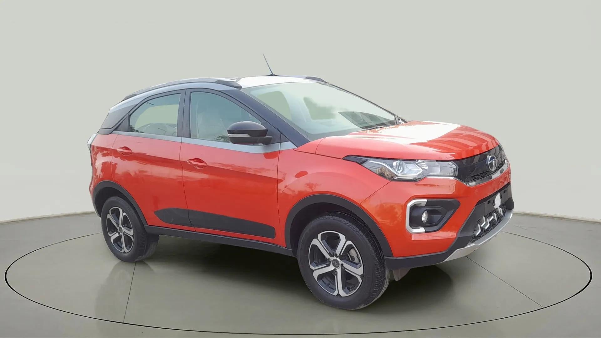 Front three-quarter view of a Flame Red Tata Nexon 2017-2023